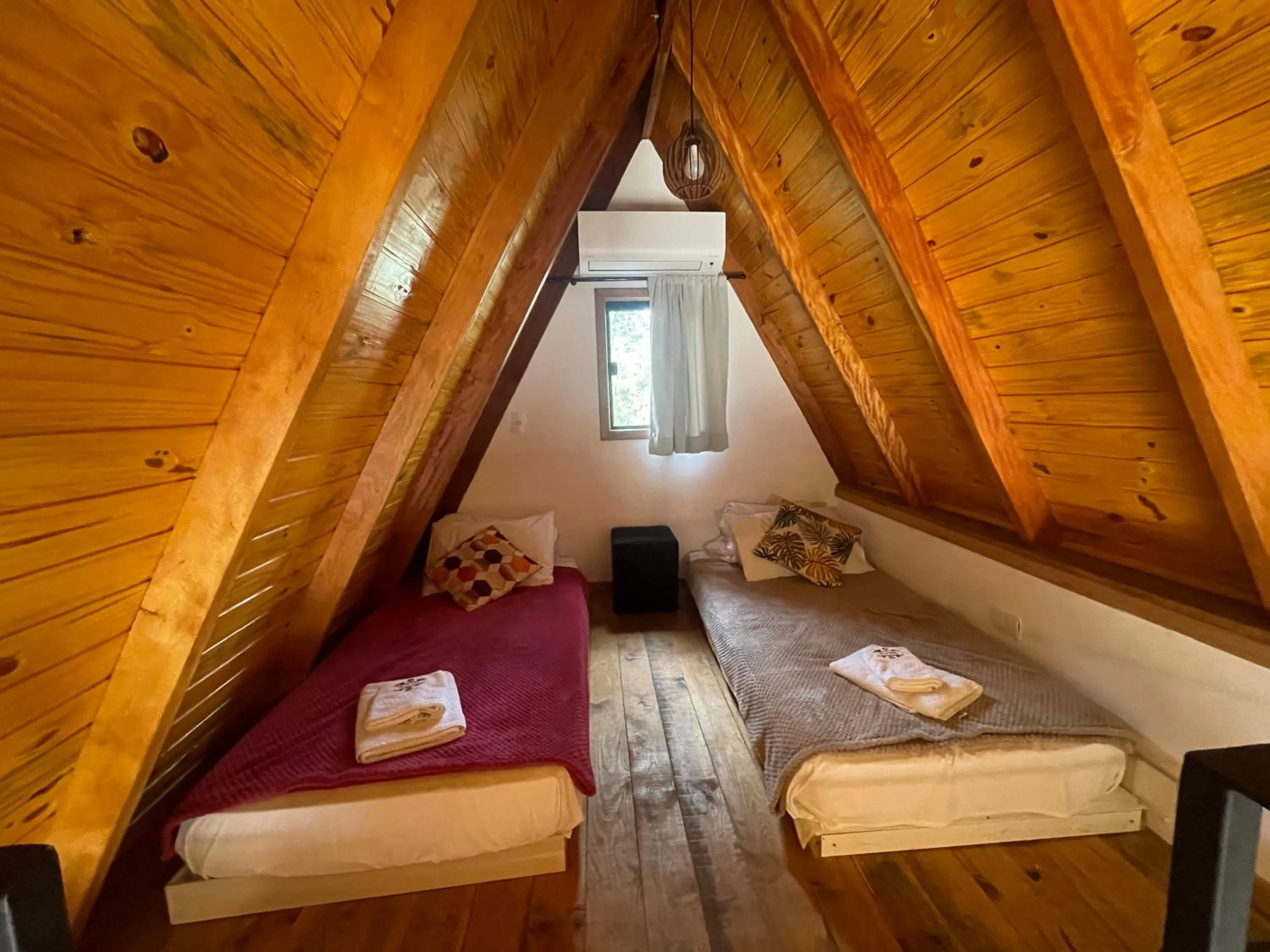 Bed in VILLA ITÁLIA CHALÉ