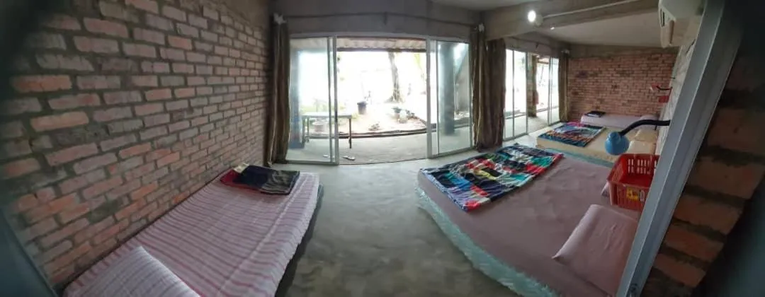 Bedroom in Hotel O Naga Puri Beach Retreat