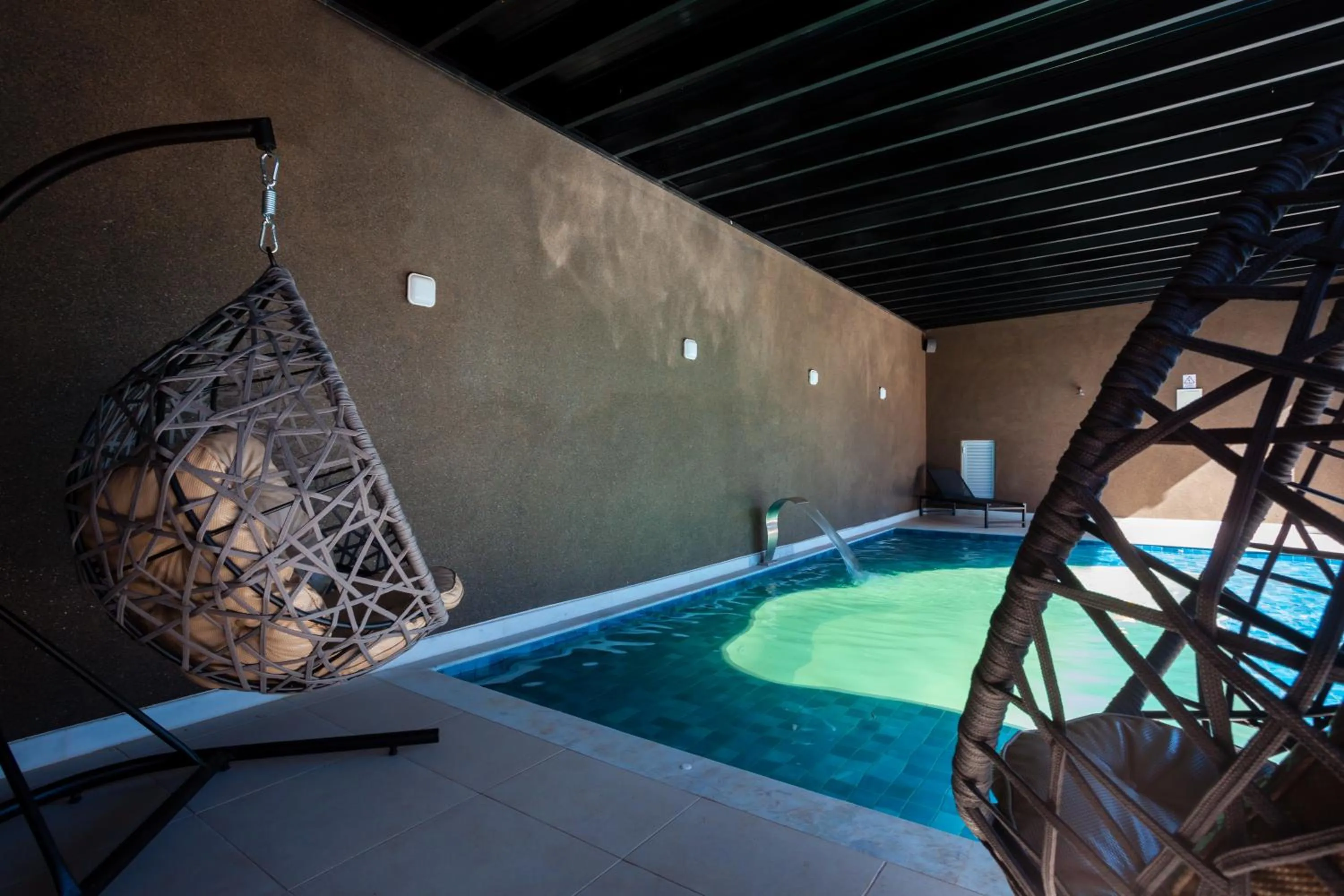 Swimming pool in Sophita Business Hotel