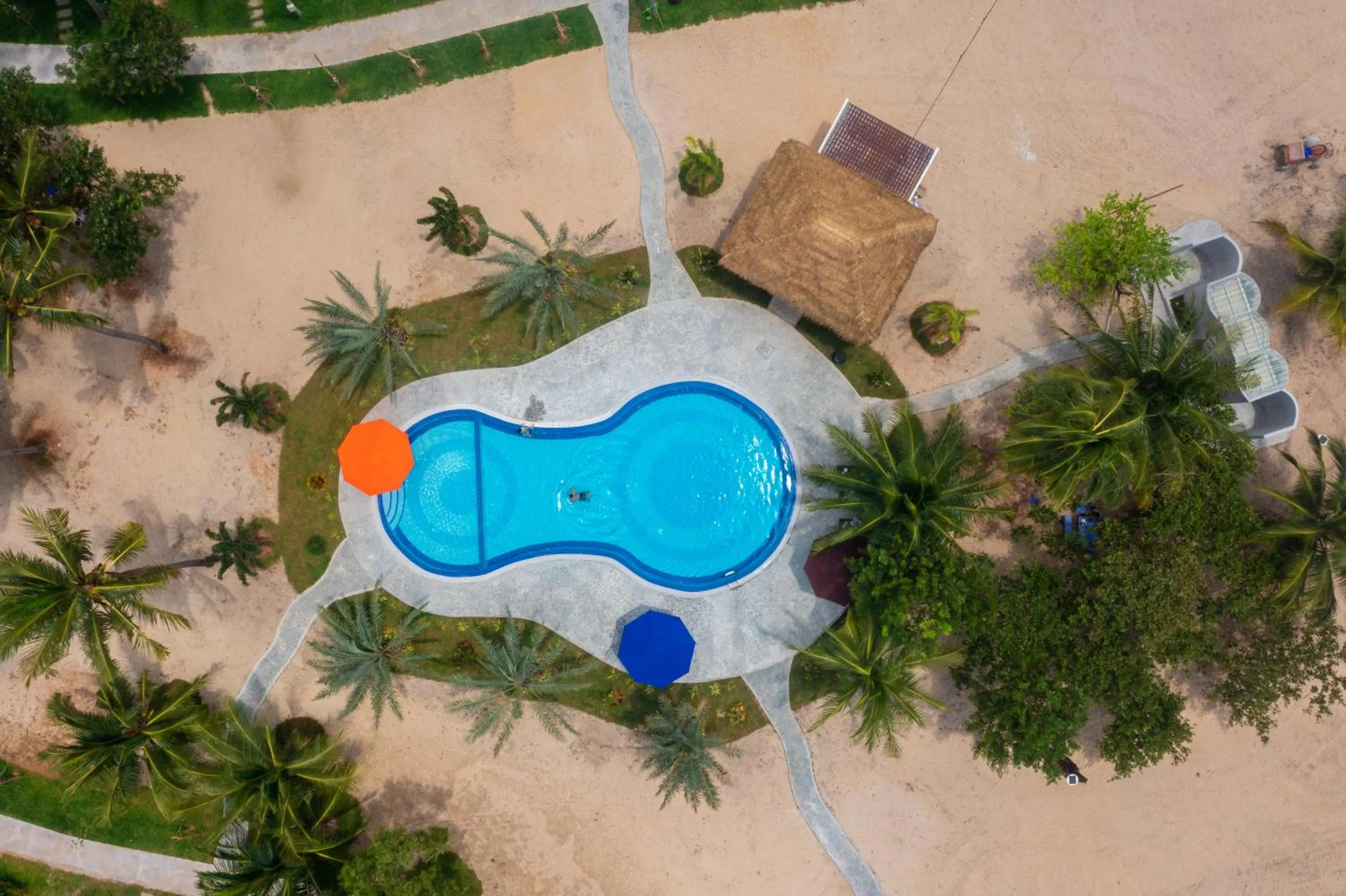 Swimming pool in SS Villa & Resort