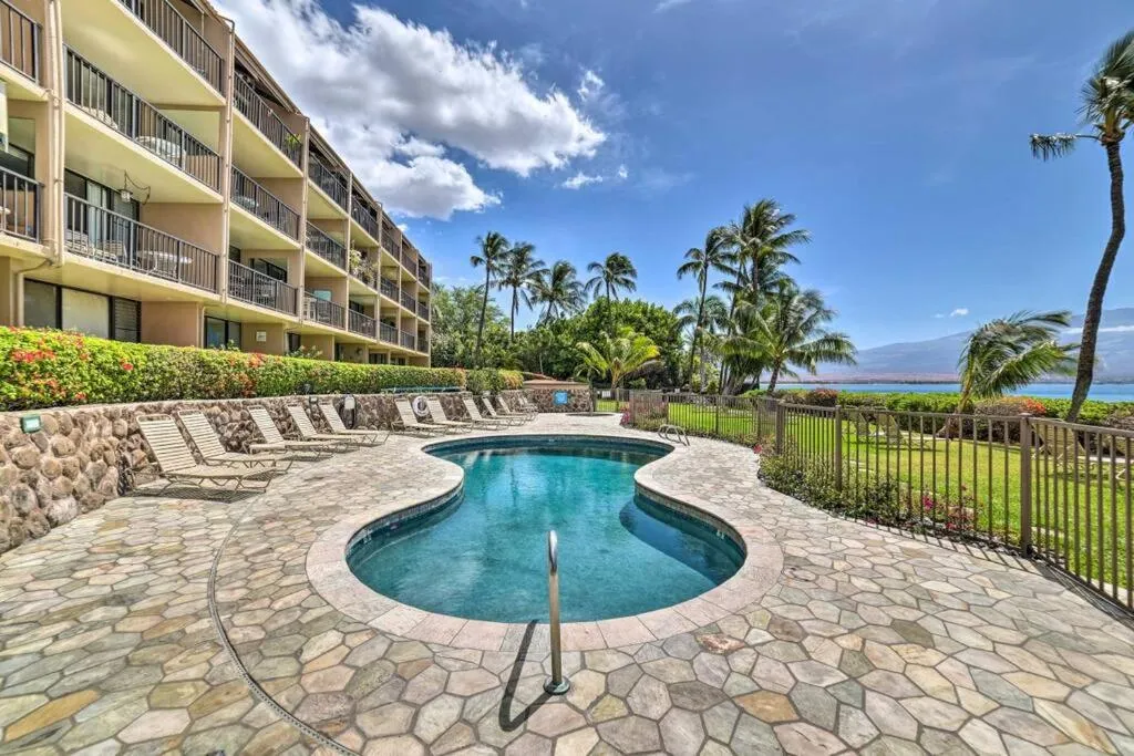 Pool view in Stunning Maui Direct Ocean front on the beach, Walk to beach from Condo, Watch Turtles, Whales, AC in all rooms ocean view Pool and Spa