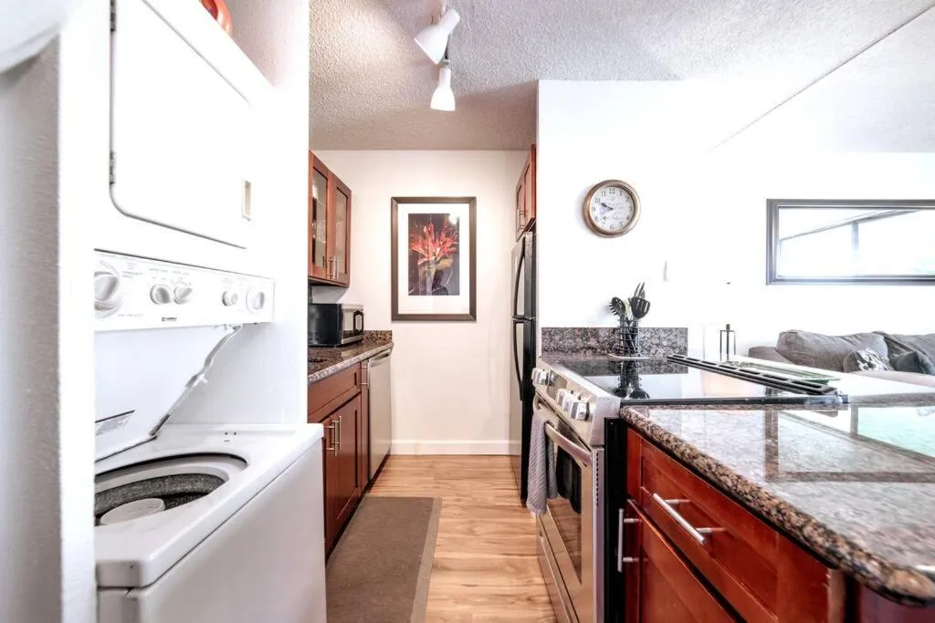 washing machine in Stunning Maui Direct Ocean front on the beach, Walk to beach from Condo, Watch Turtles, Whales, AC in all rooms ocean view Pool and Spa