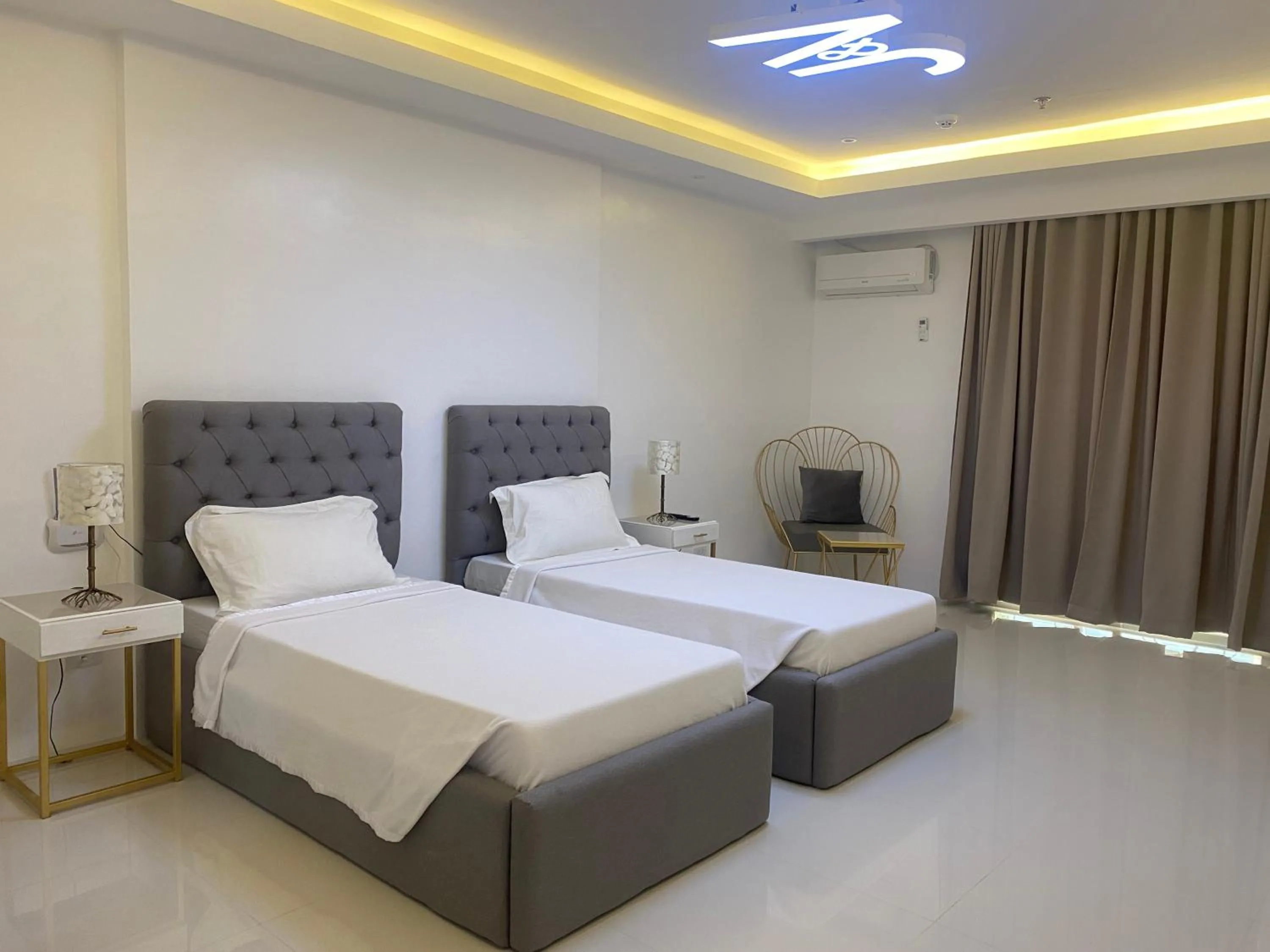 Bed in J&V Hotel and Resort