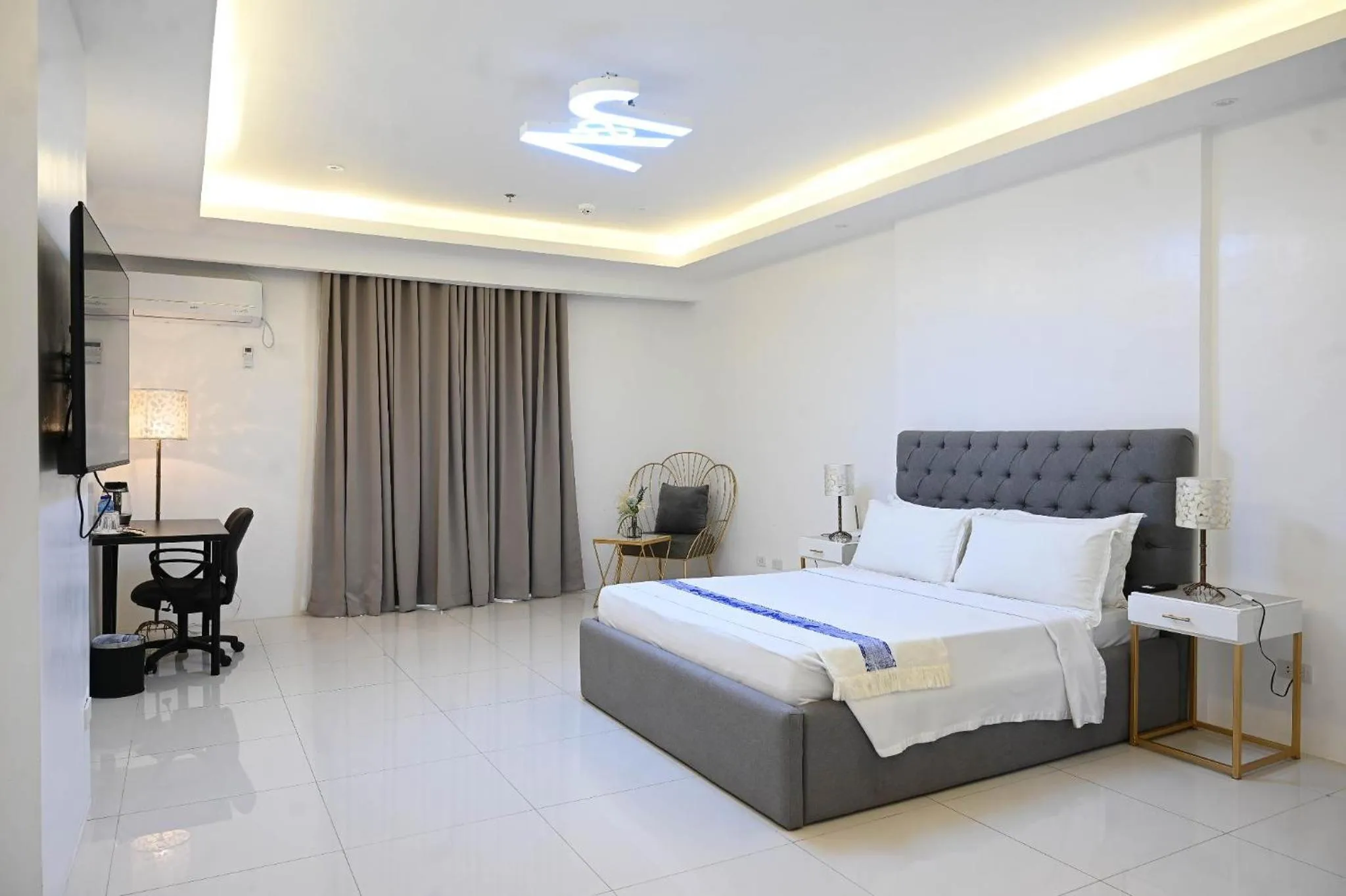 Bed in J&V Hotel and Resort