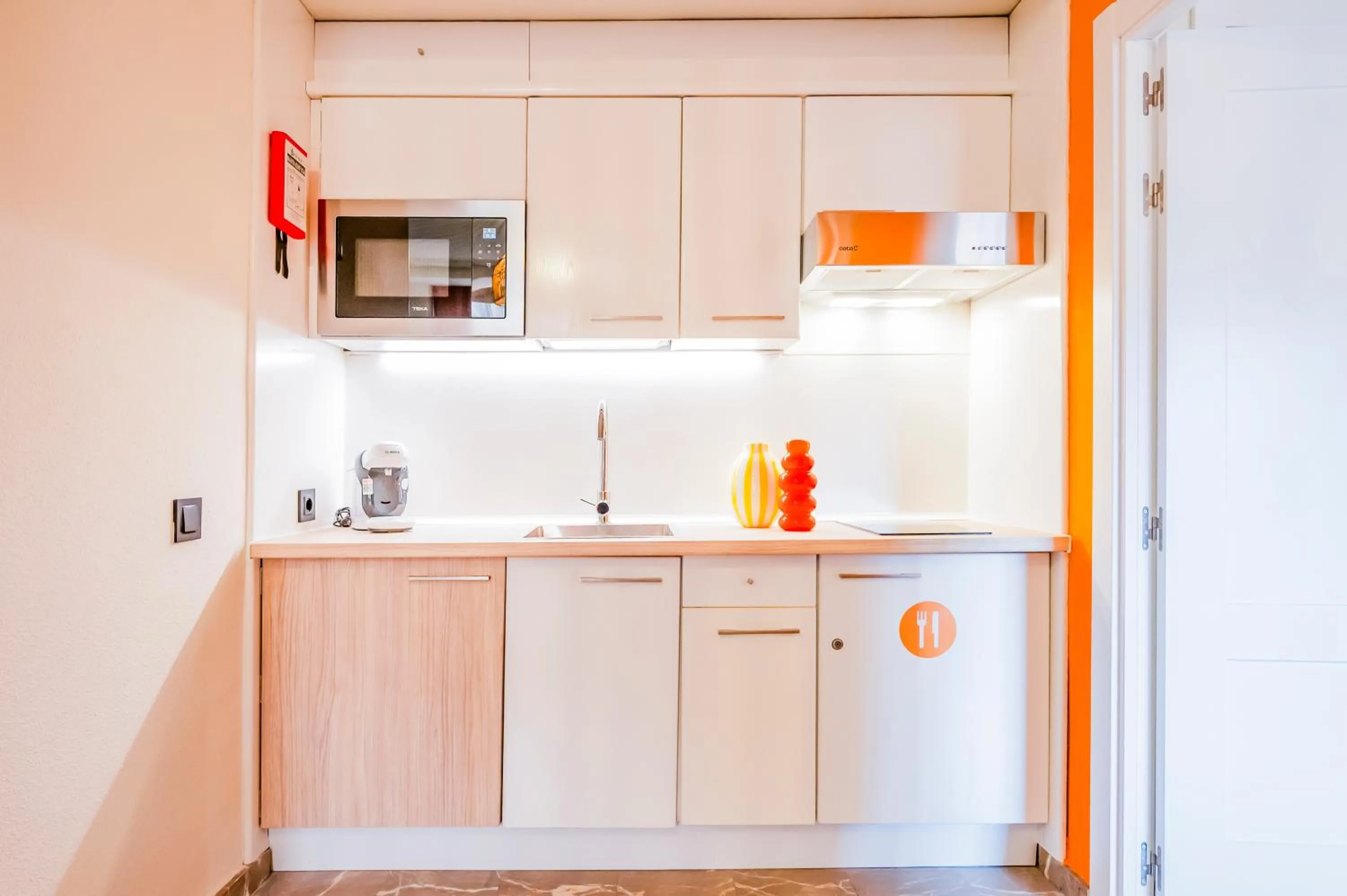 Kitchen or kitchenette in Apartamentos G3 Galeon