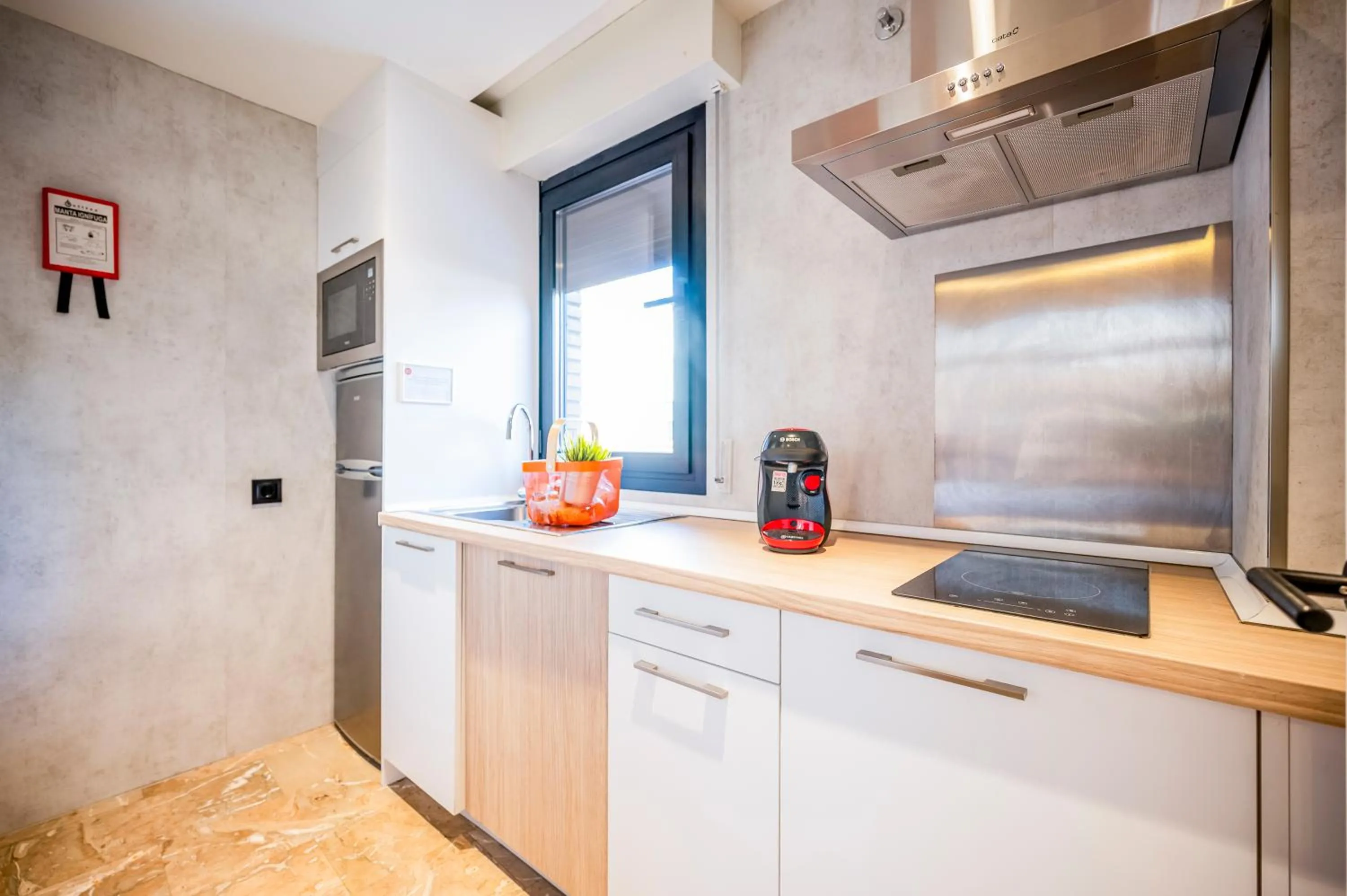 Kitchen or kitchenette in Apartamentos G3 Galeon