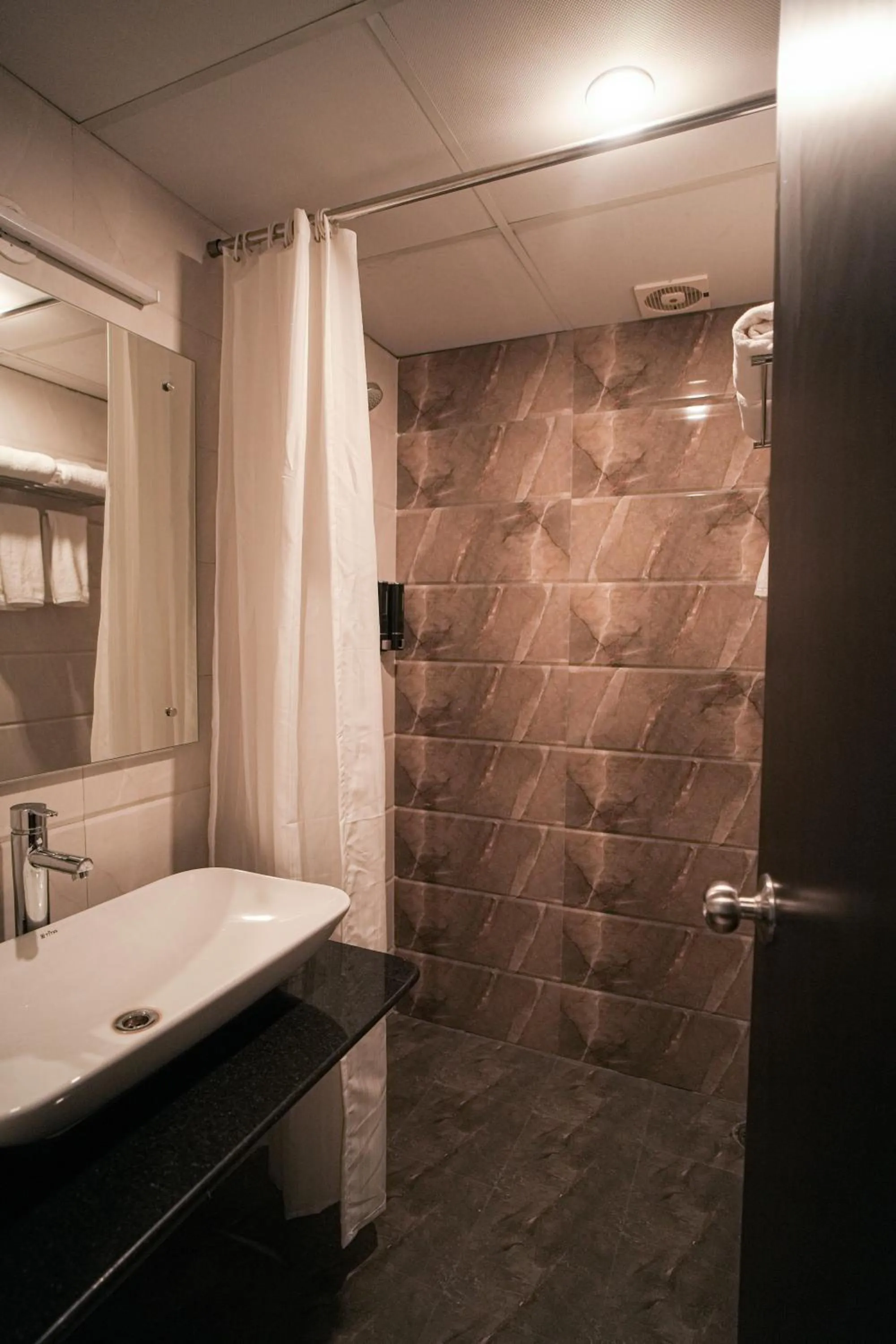 Shower in VITS SELECT BENGALURU Near Manyata Tech