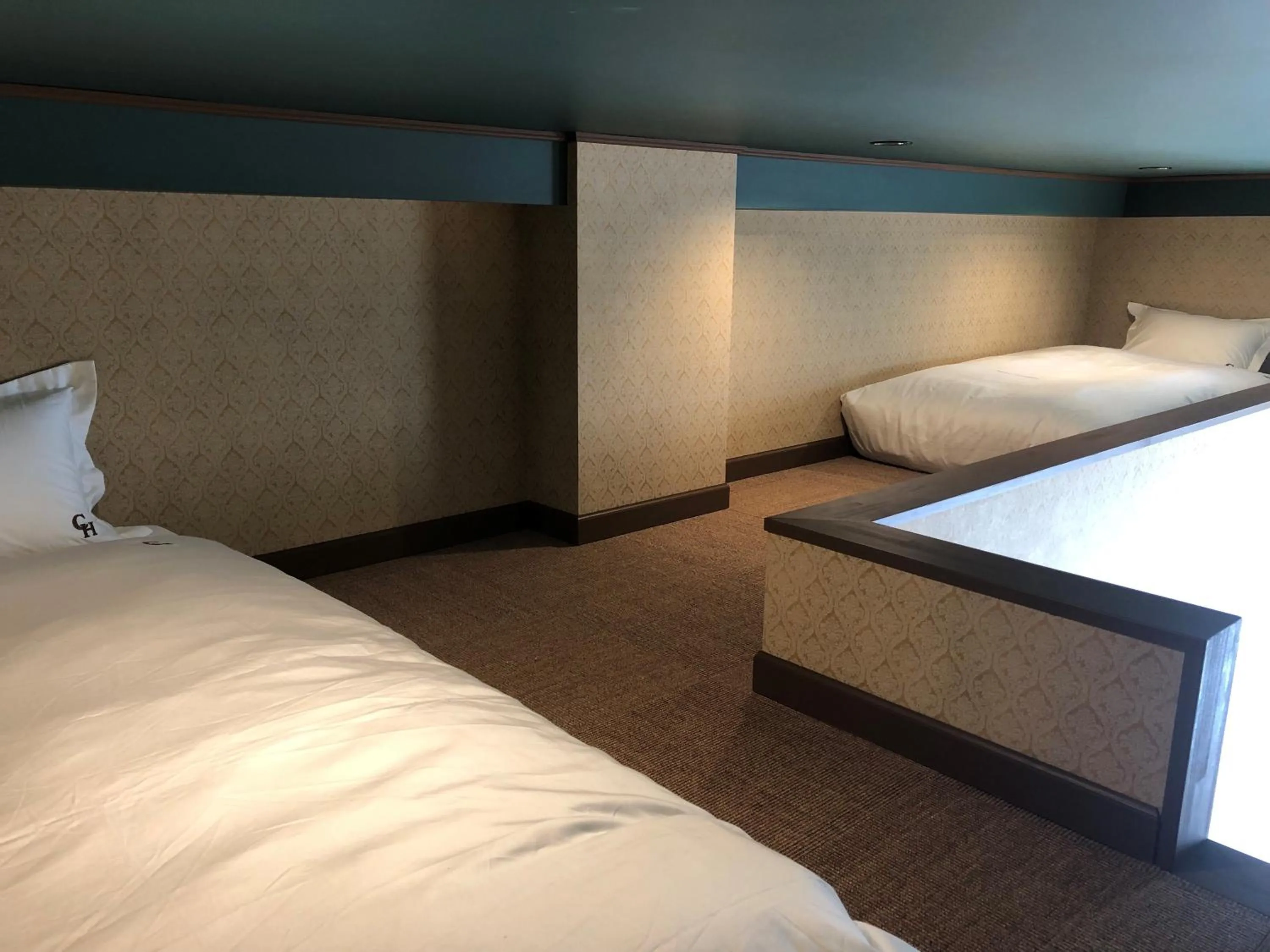 Bed in COFFEE HOTEL Soundwave