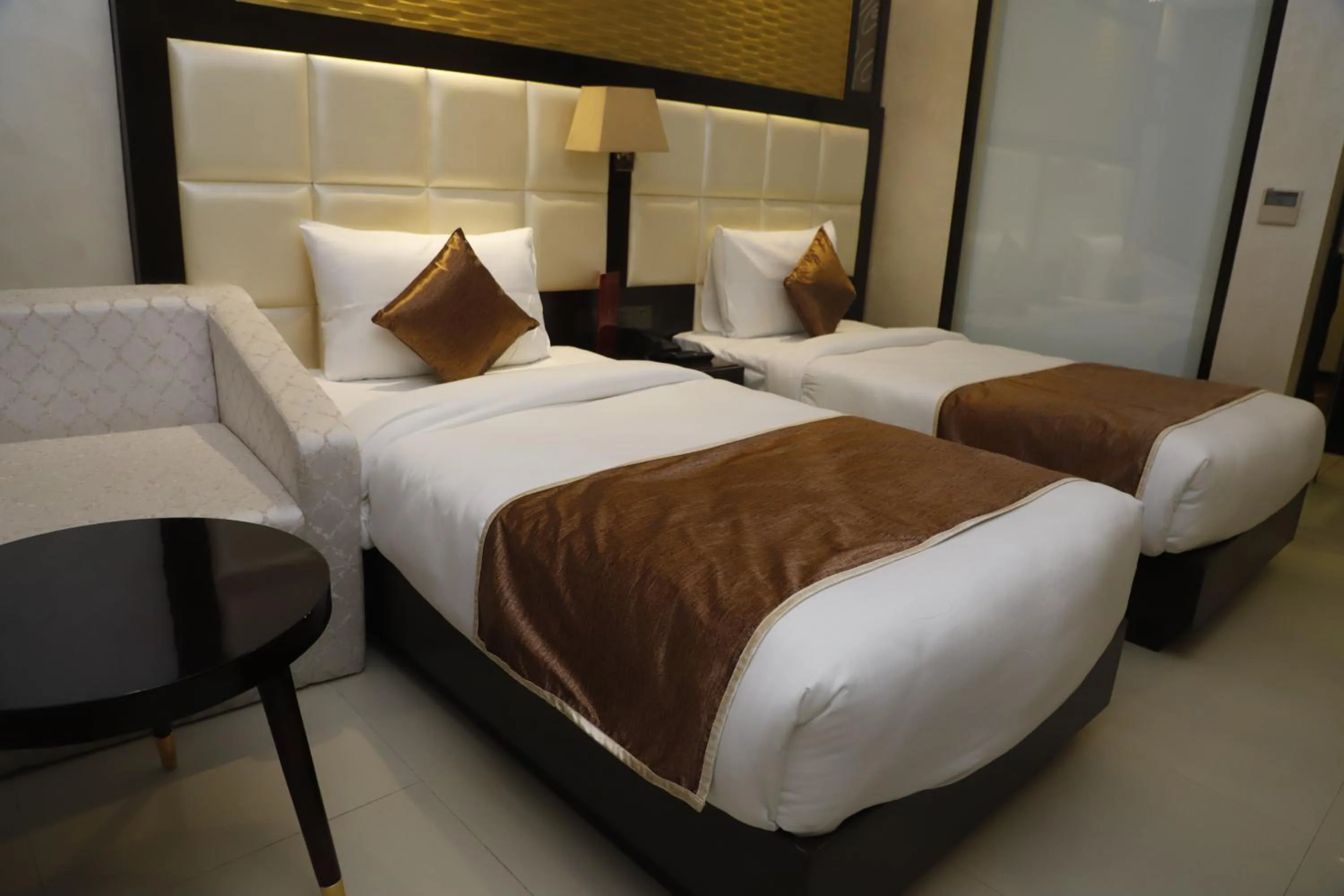 Bed in Udman Hotel at 18km from IGI Airport, By Ferns N Petals, Chattarpur, Delhi