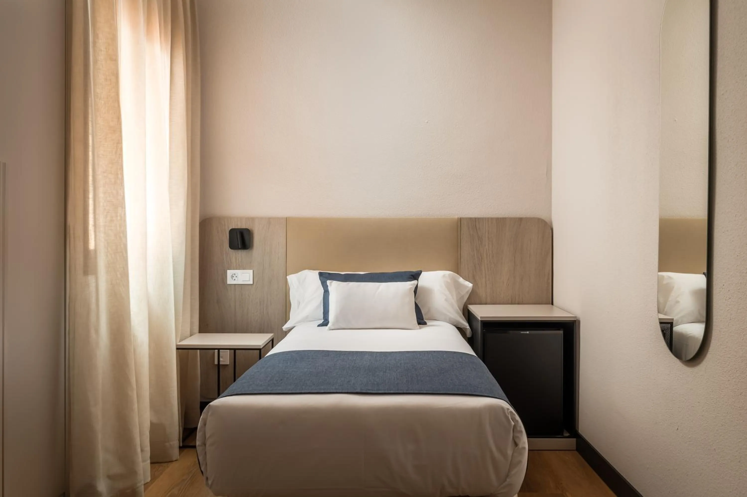 Bed in Hotel Don Jaime 54