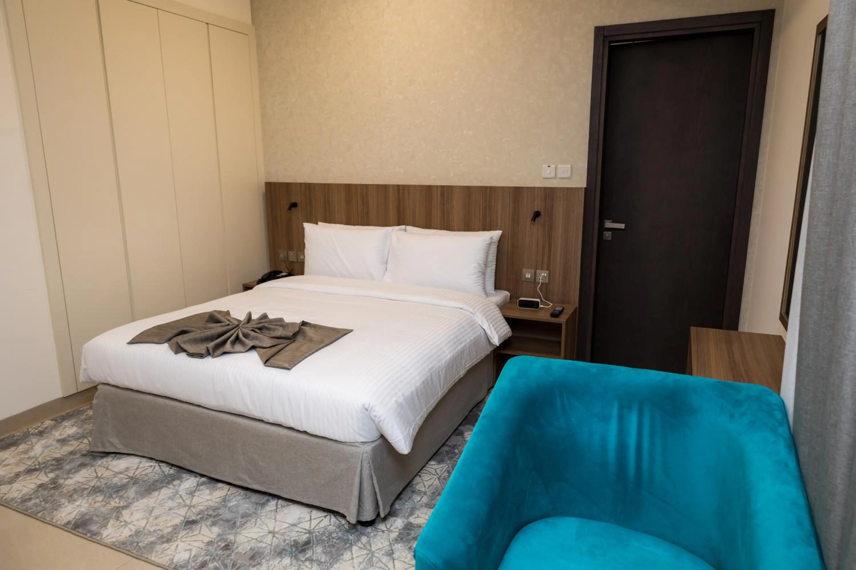 Bed in Azur Regency Hotel Apartments