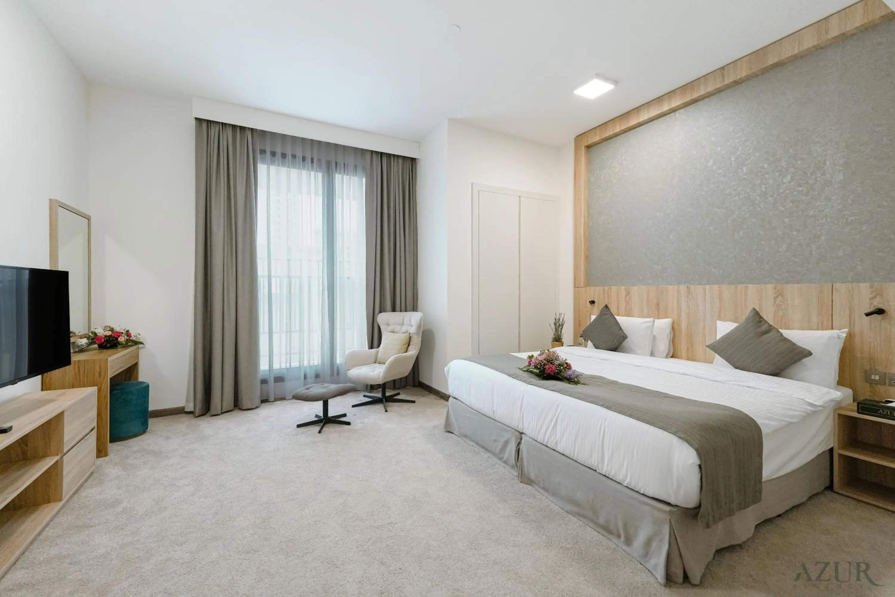 Bed in Azur Regency Hotel Apartments