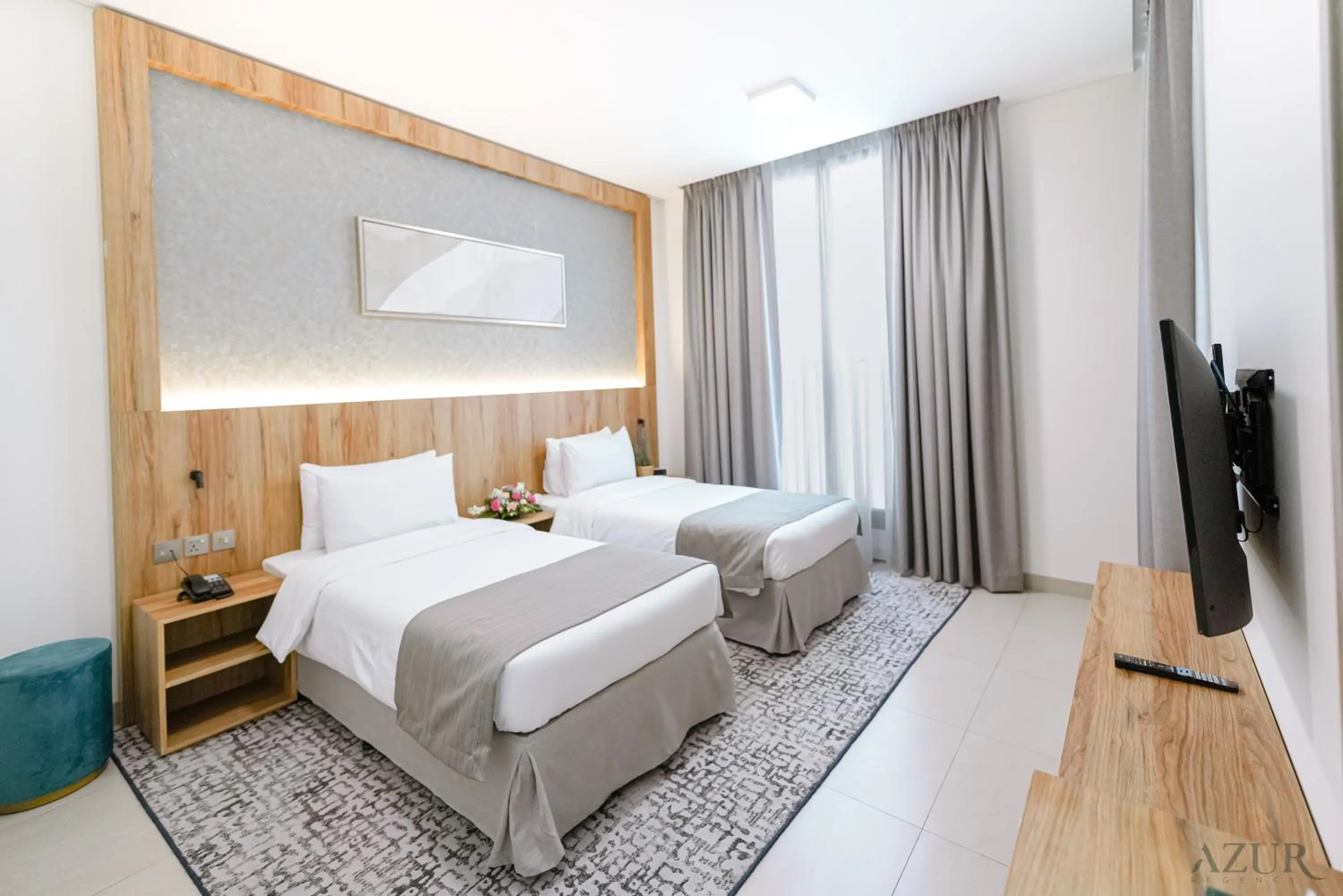 Bed in Azur Regency Hotel Apartments