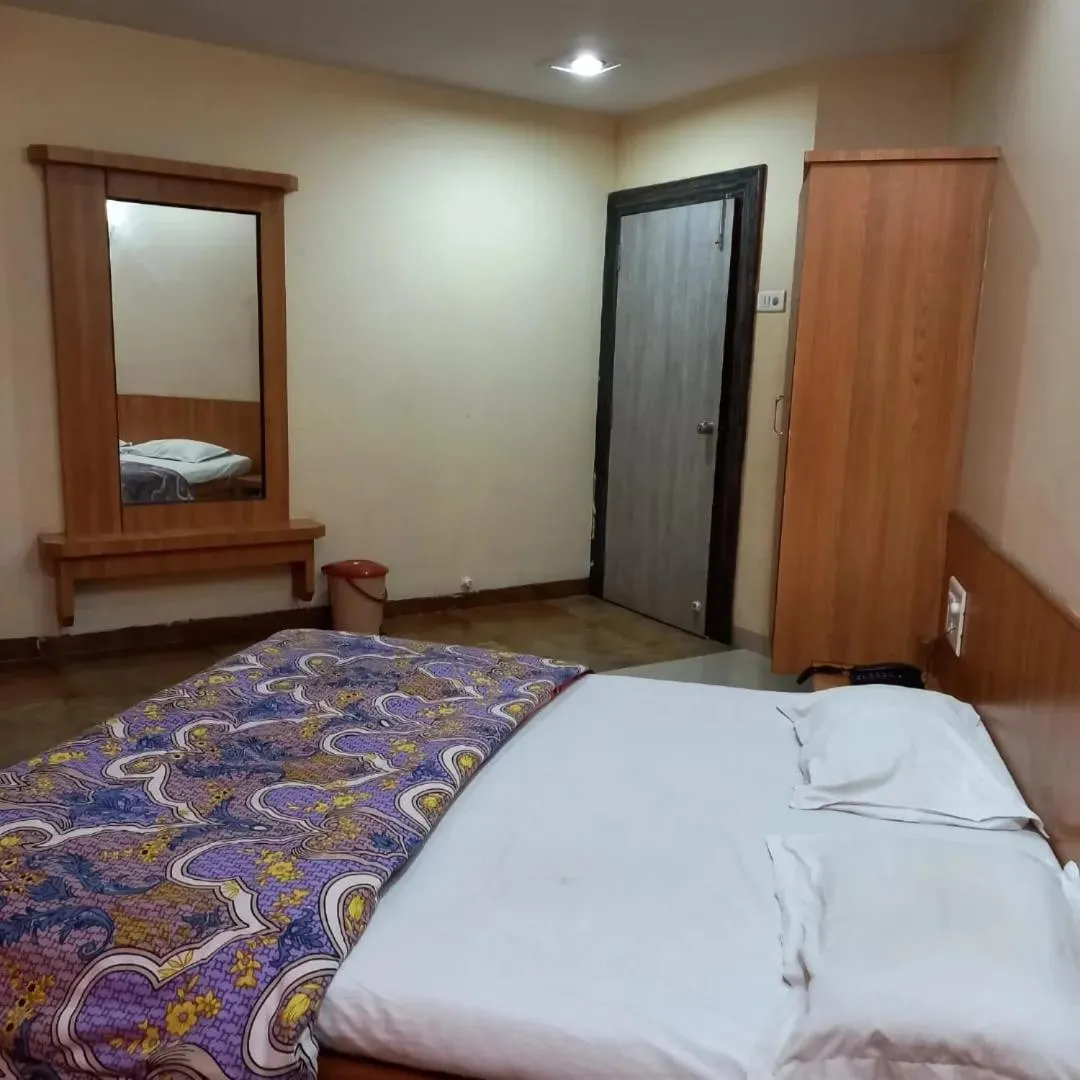 Bed in sharan hotel