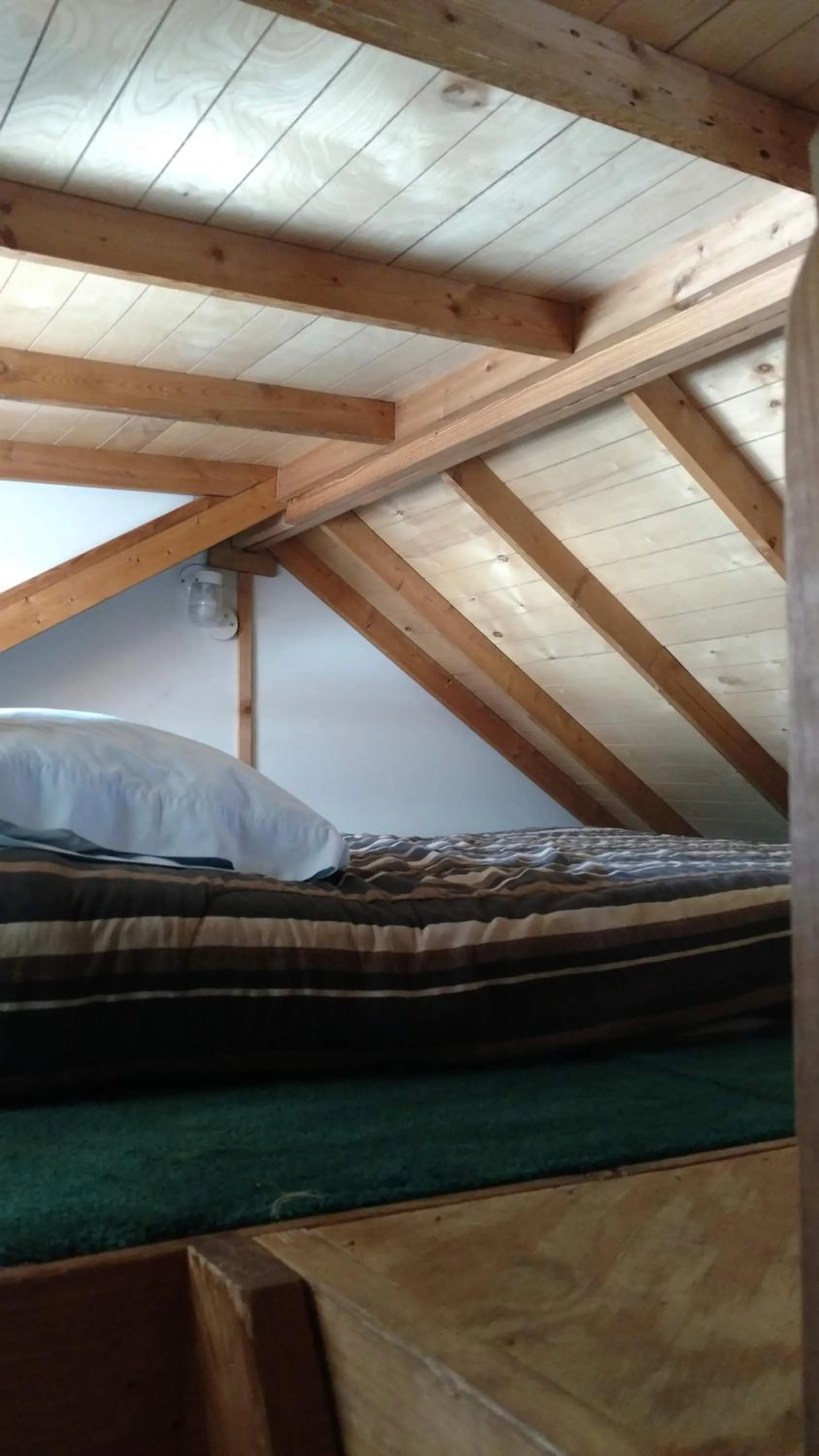 Bed in Chama River Bend Lodge