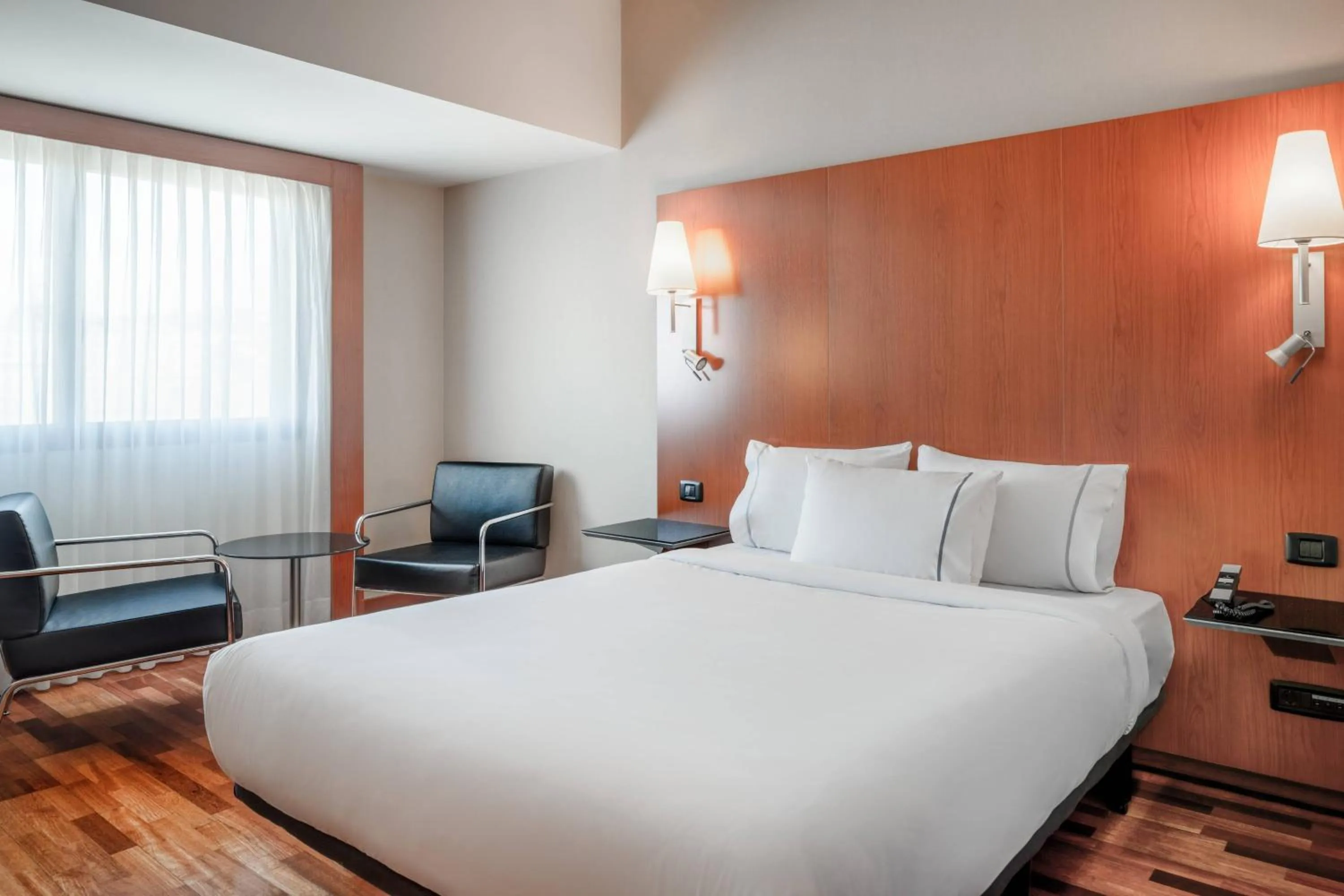 Photo of the whole room, Bed in AC Hotel A Coruña by Marriott