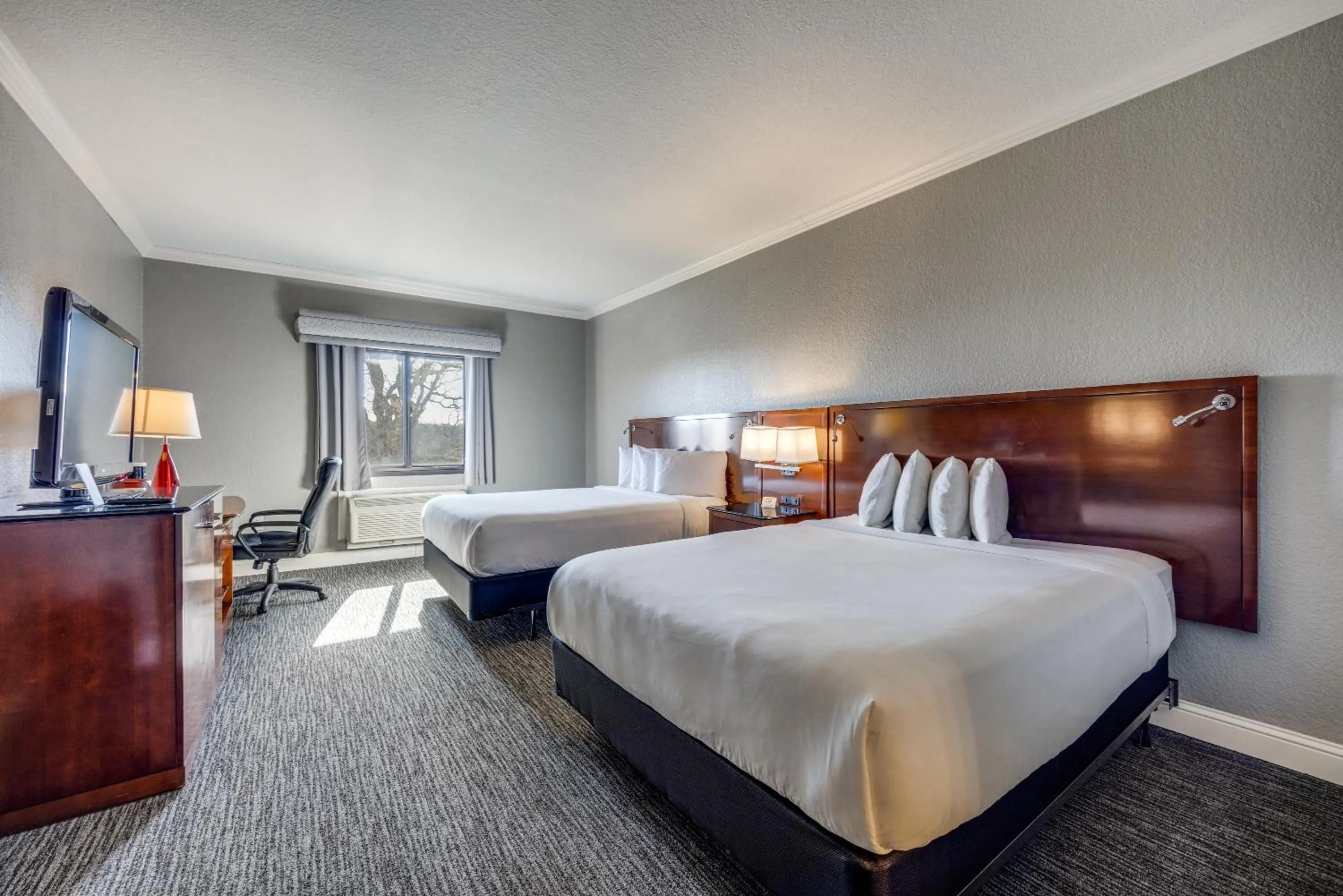 Bed in Tanglewood Resort on Lake Texoma, an Ascend Collection Resort