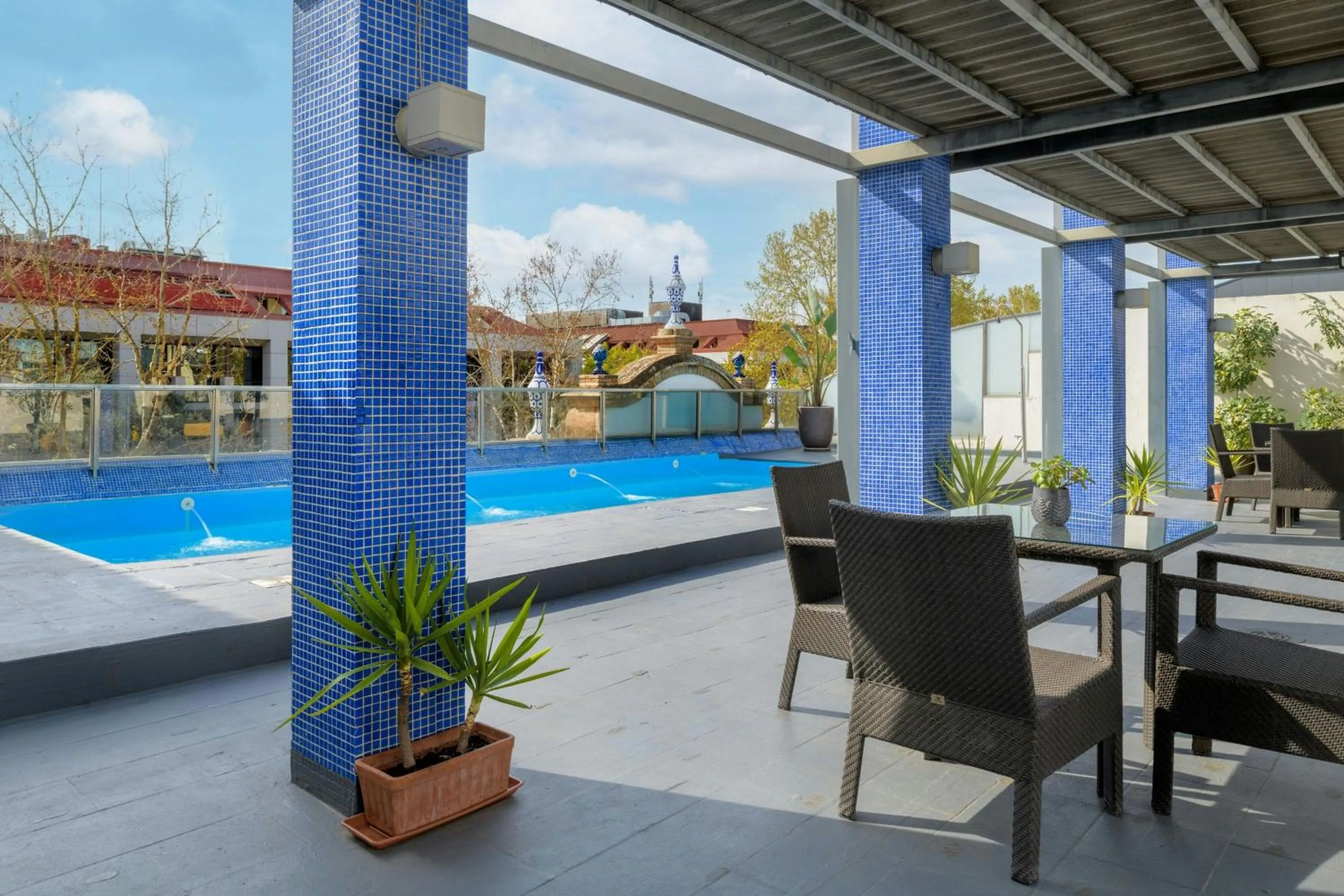 Swimming pool in AC Hotel Ciudad de Sevilla by Marriott