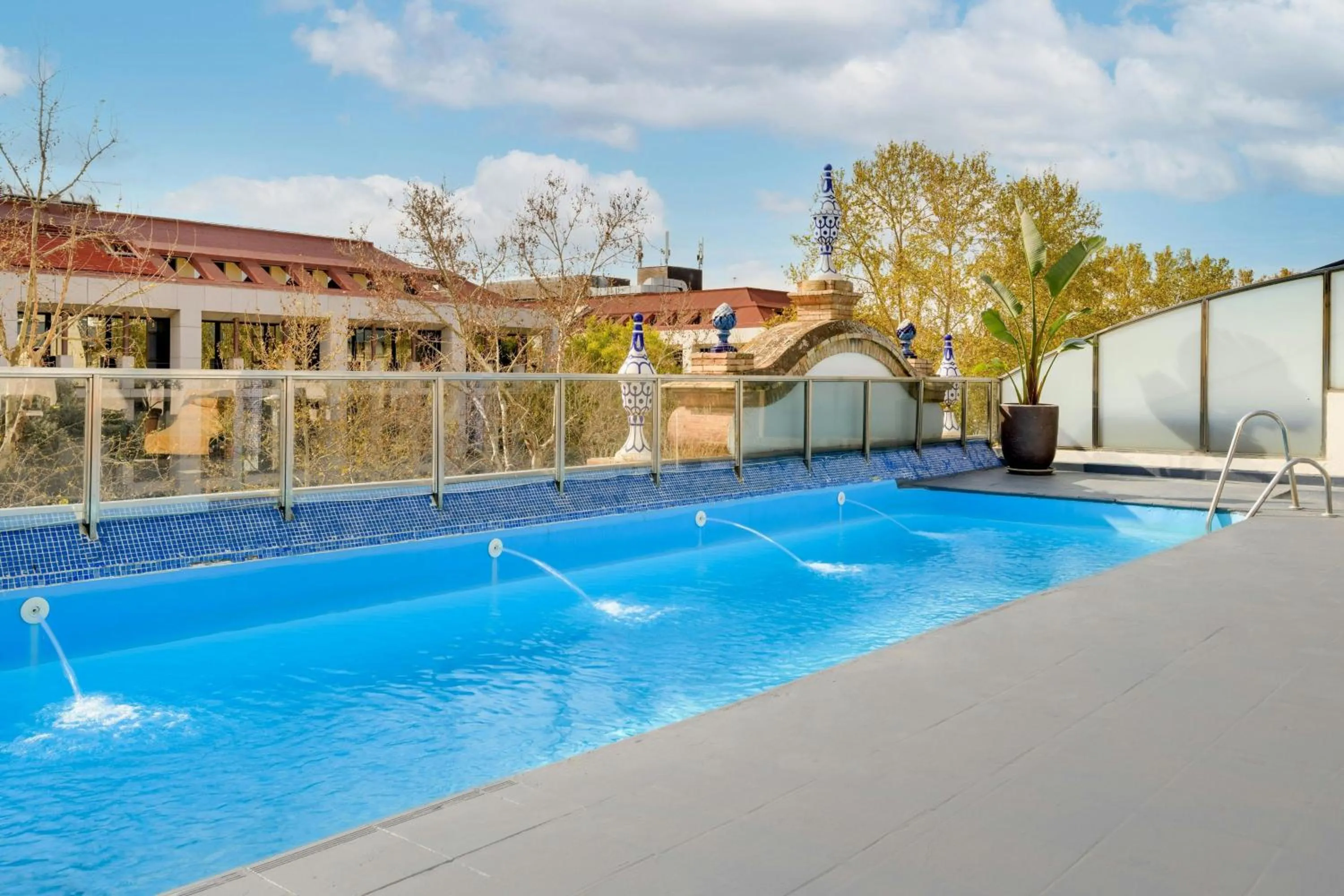 Swimming pool in AC Hotel Ciudad de Sevilla by Marriott
