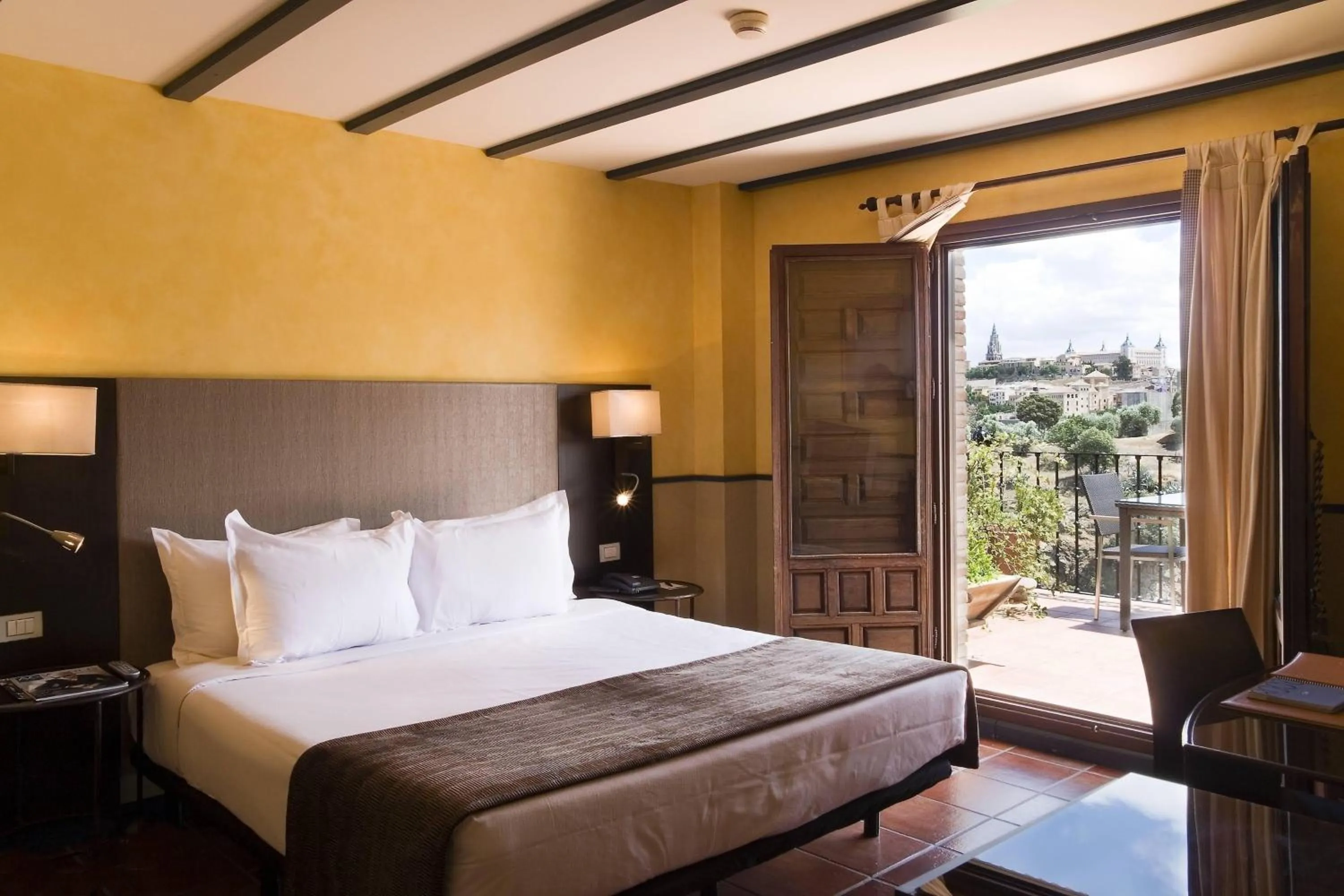 Photo of the whole room, Bed in AC Hotel Ciudad de Toledo by Marriott