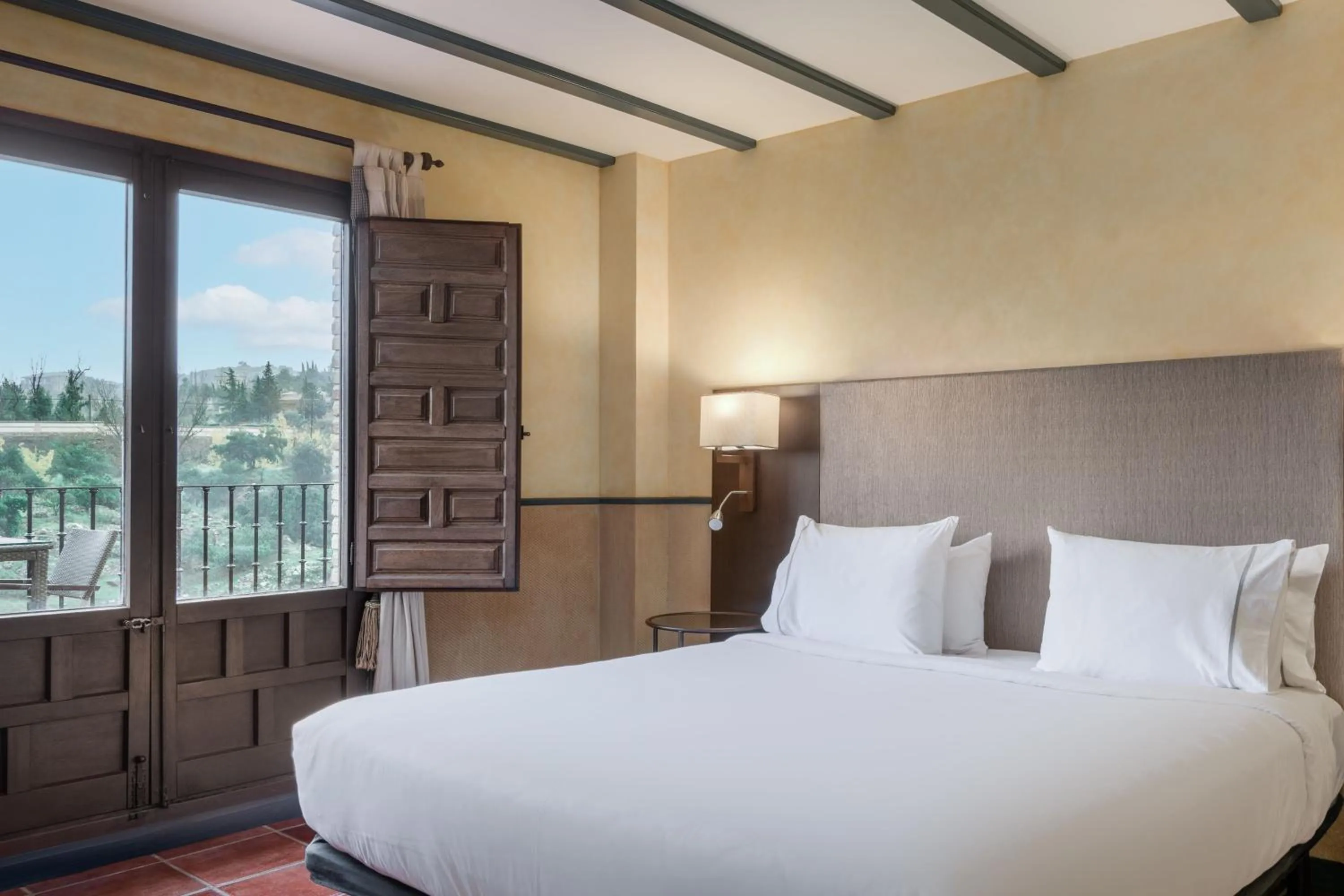 Photo of the whole room, Bed in AC Hotel Ciudad de Toledo by Marriott