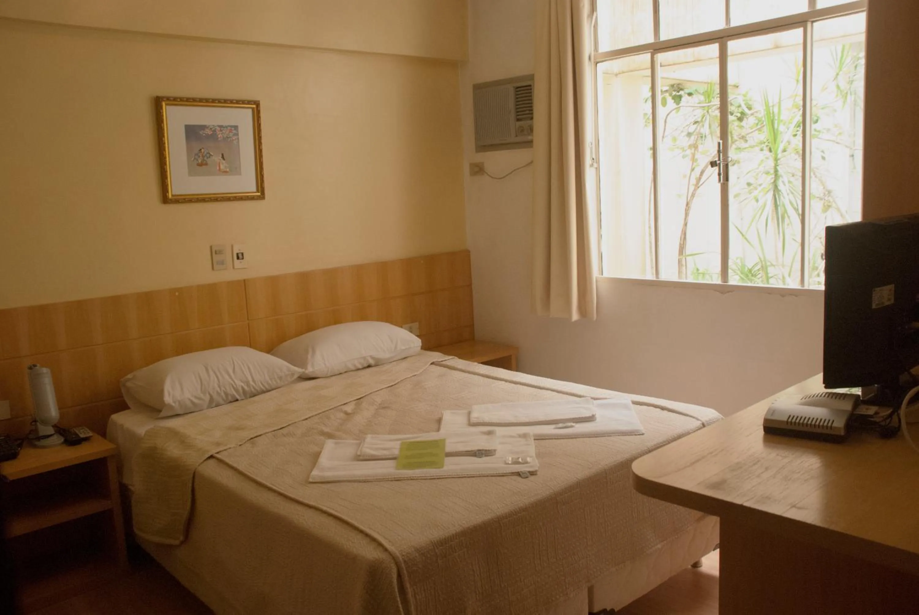 Bed in Hara Palace Hotel