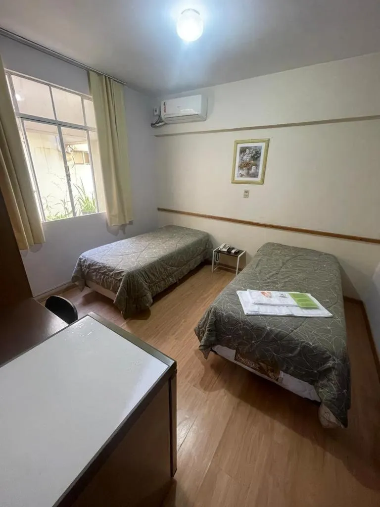 Bed in Hara Palace Hotel