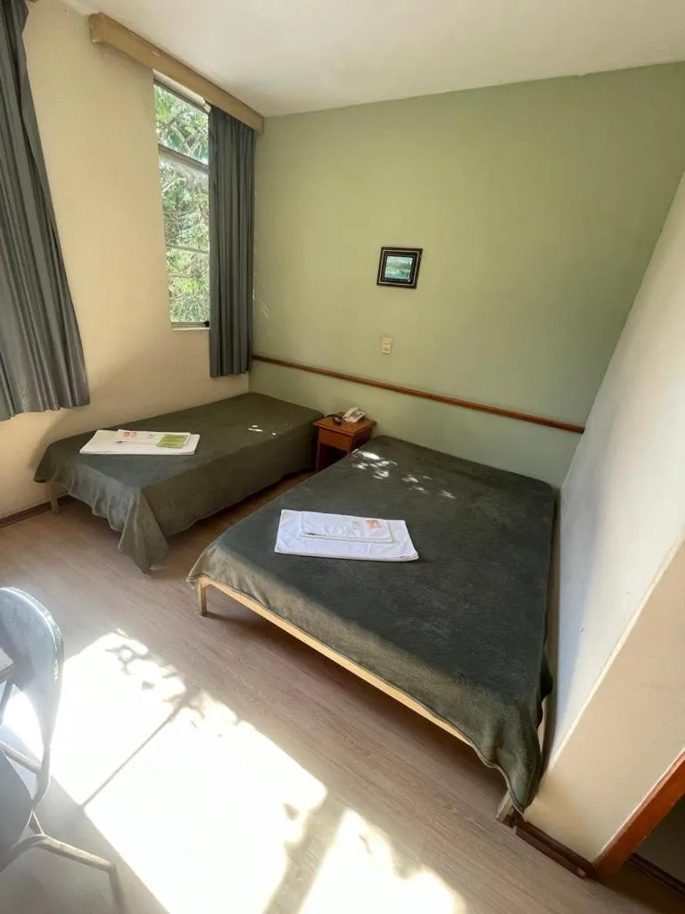 Bed in Hara Palace Hotel