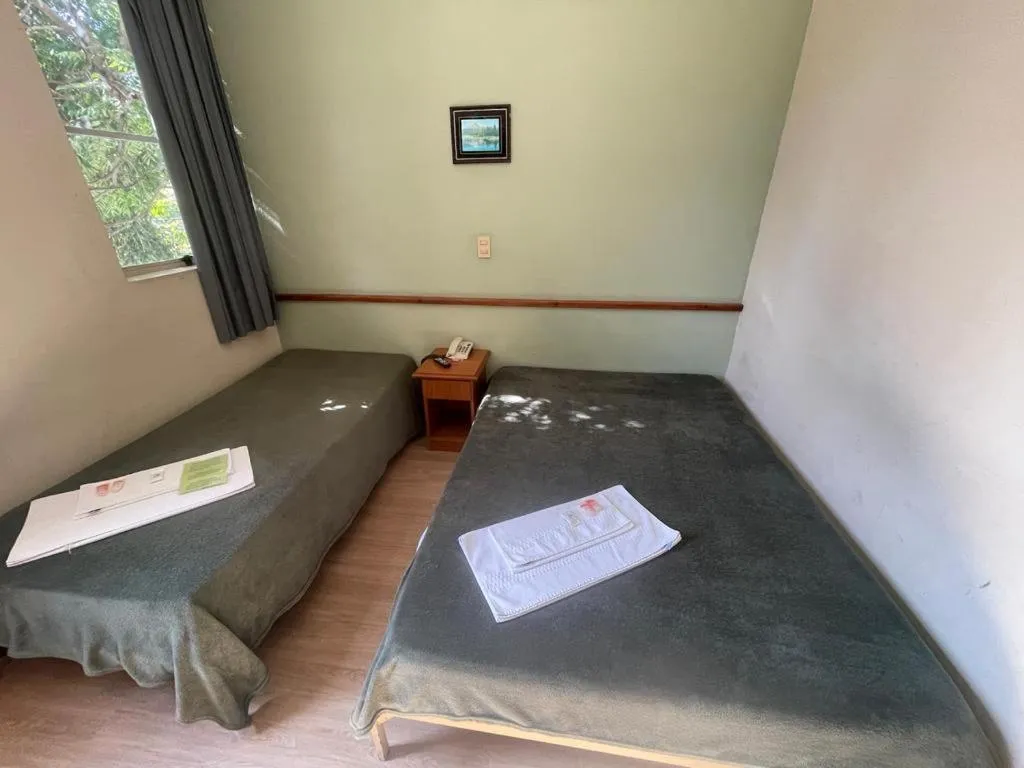 Bed in Hara Palace Hotel