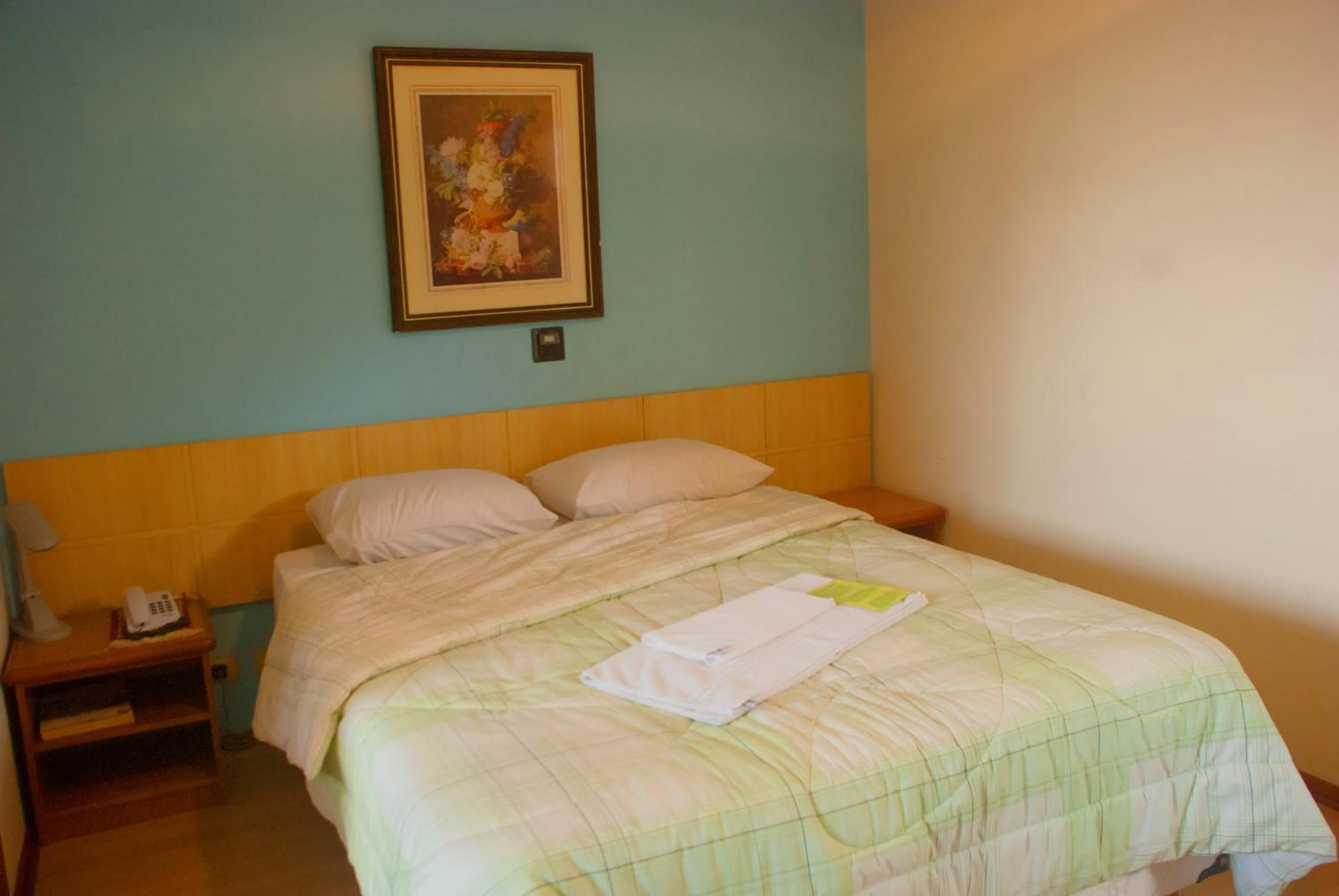 Bed in Hara Palace Hotel