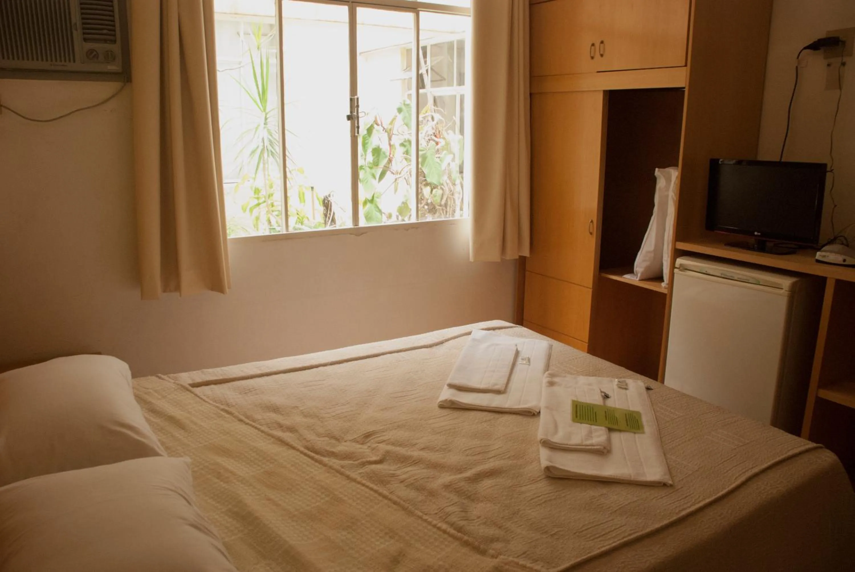 Bed in Hara Palace Hotel