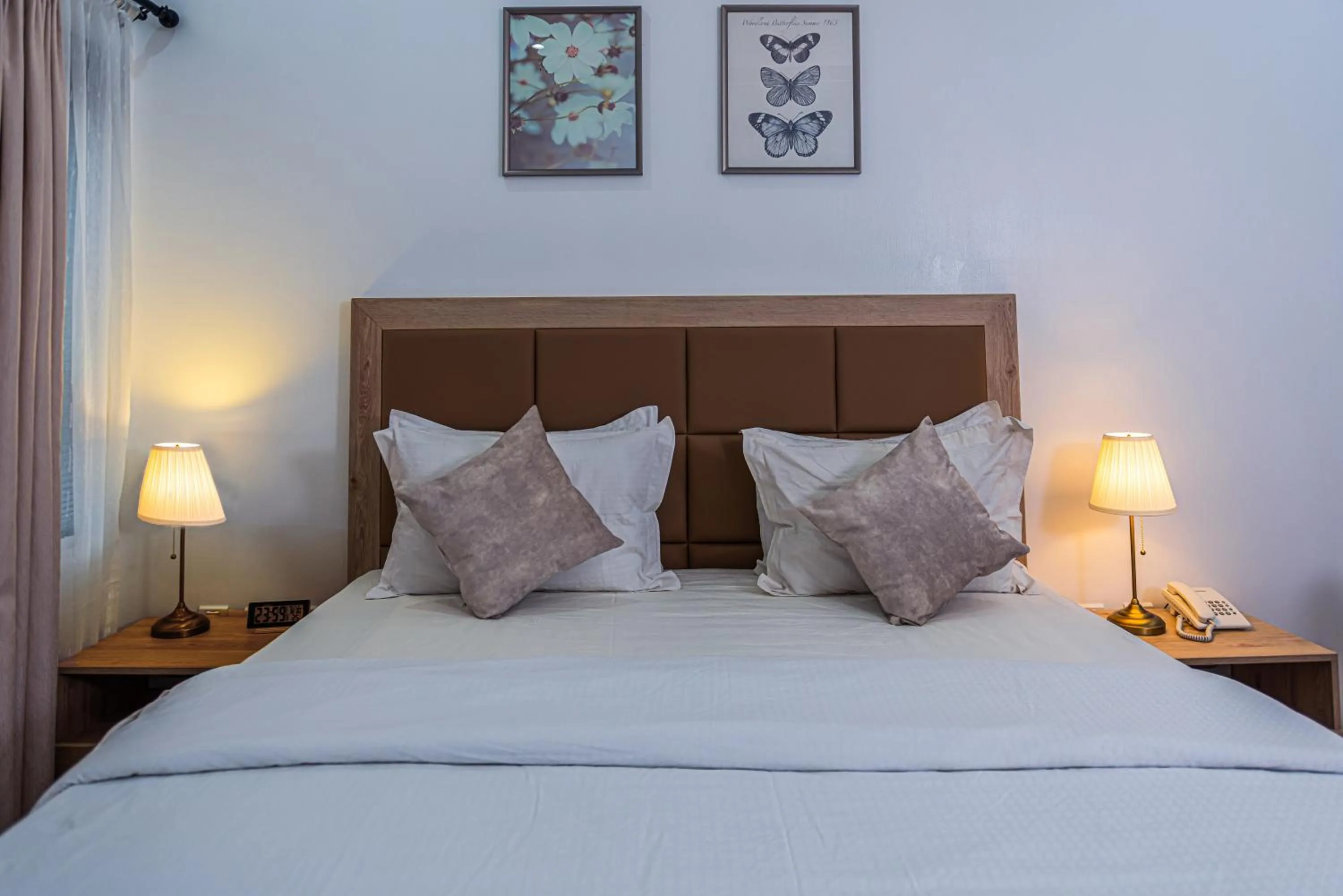 Bed in Quest Boutique Hotel