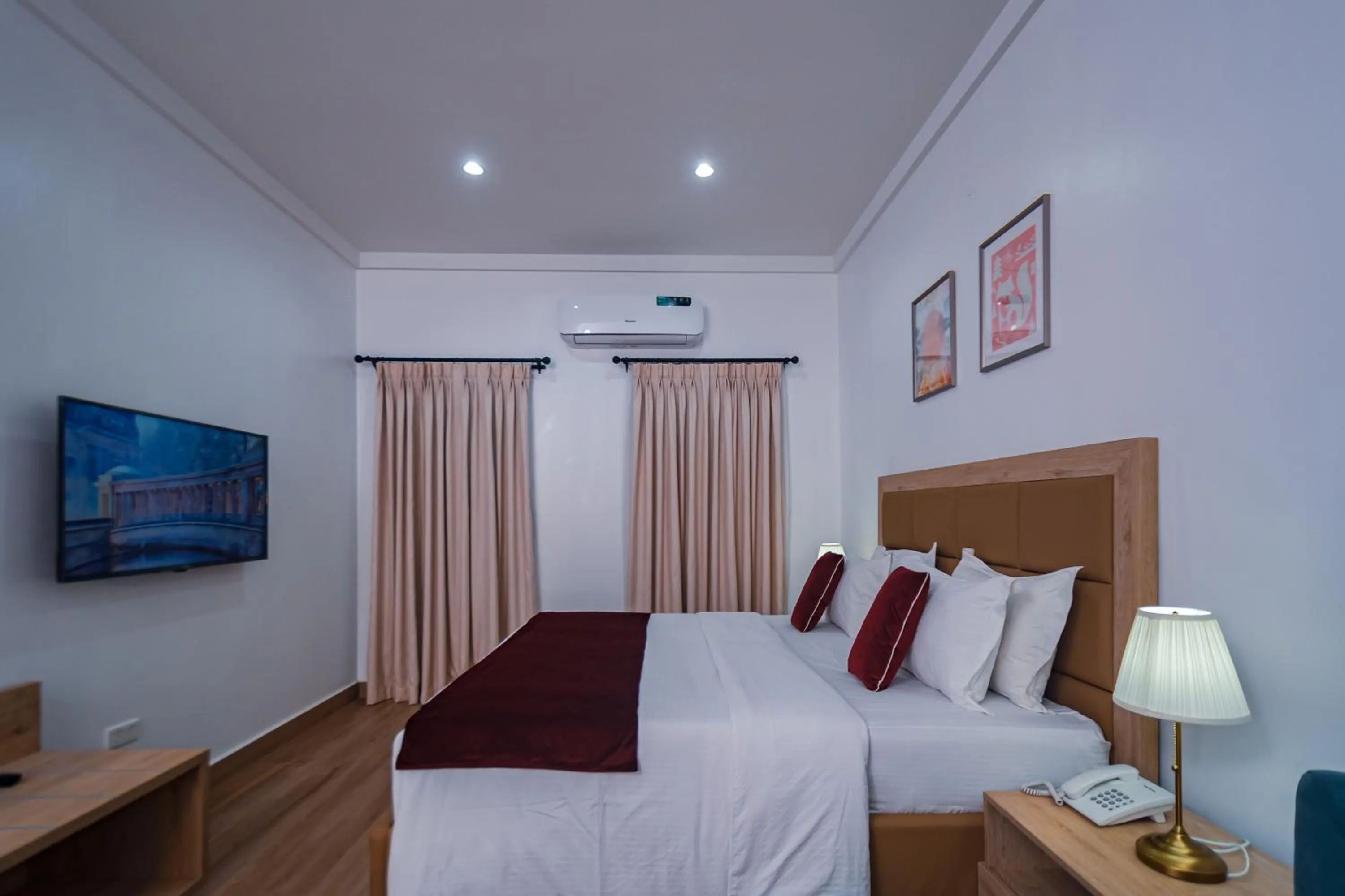 Bed in Quest Boutique Hotel