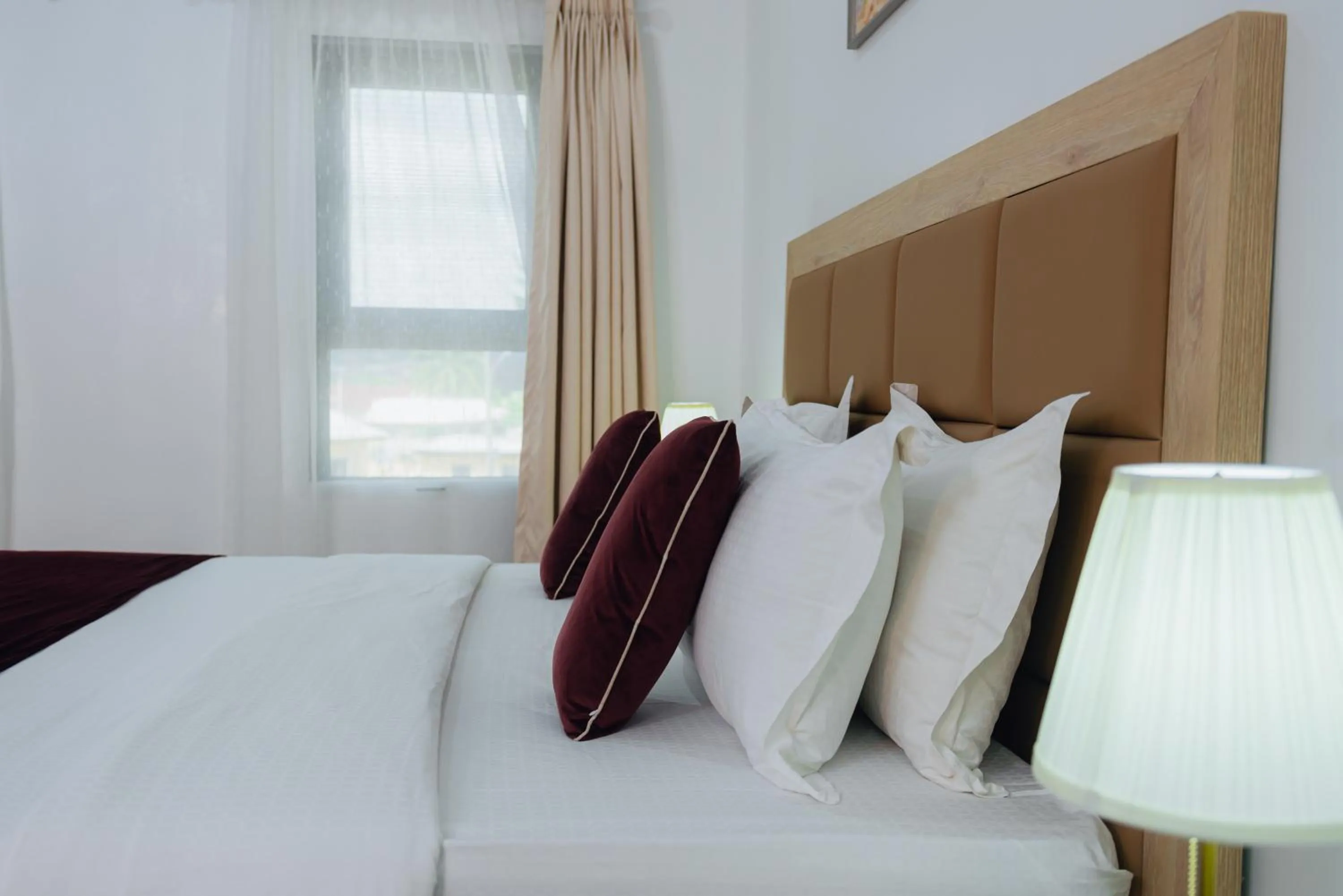 Bed in Quest Boutique Hotel