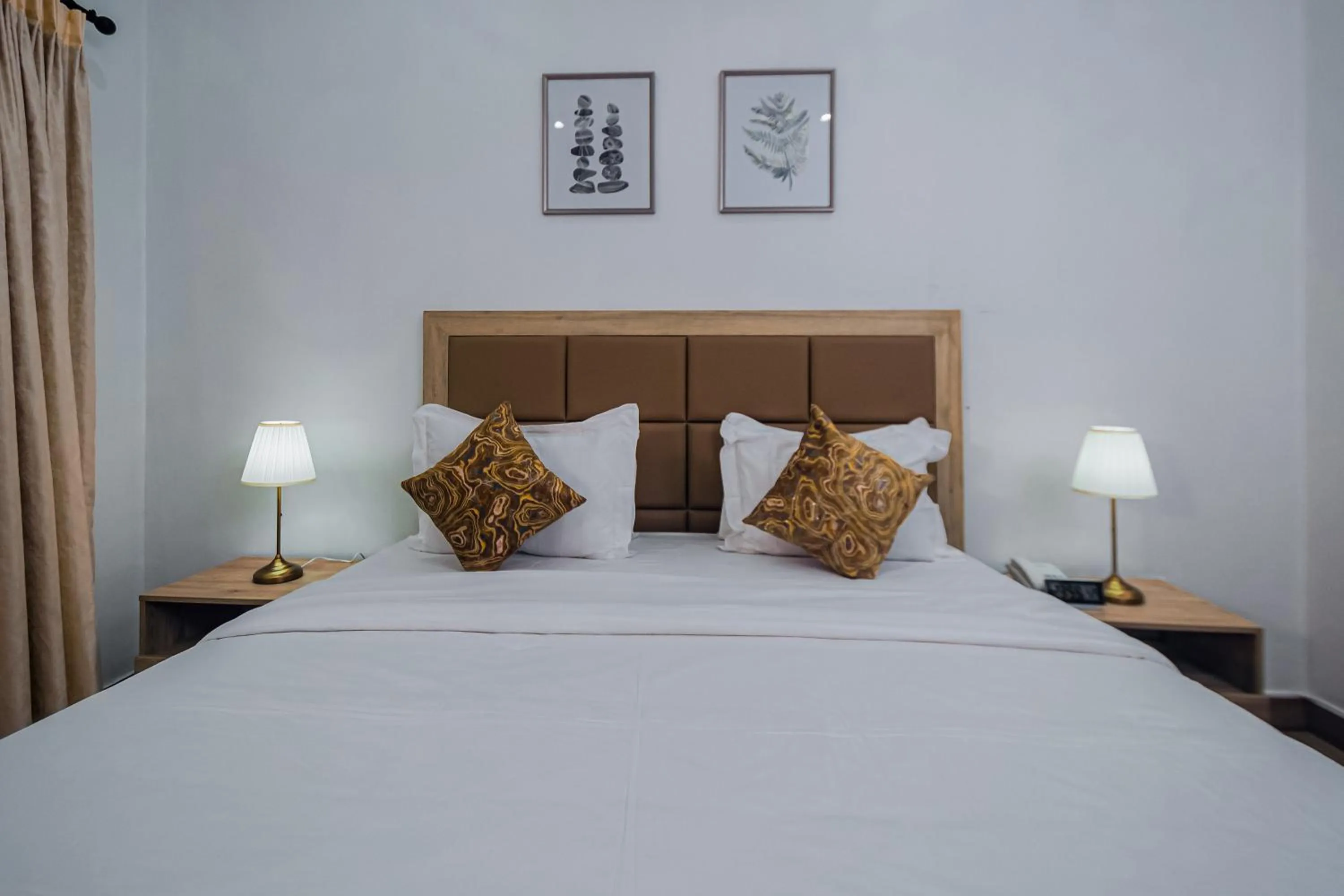 Bed in Quest Boutique Hotel