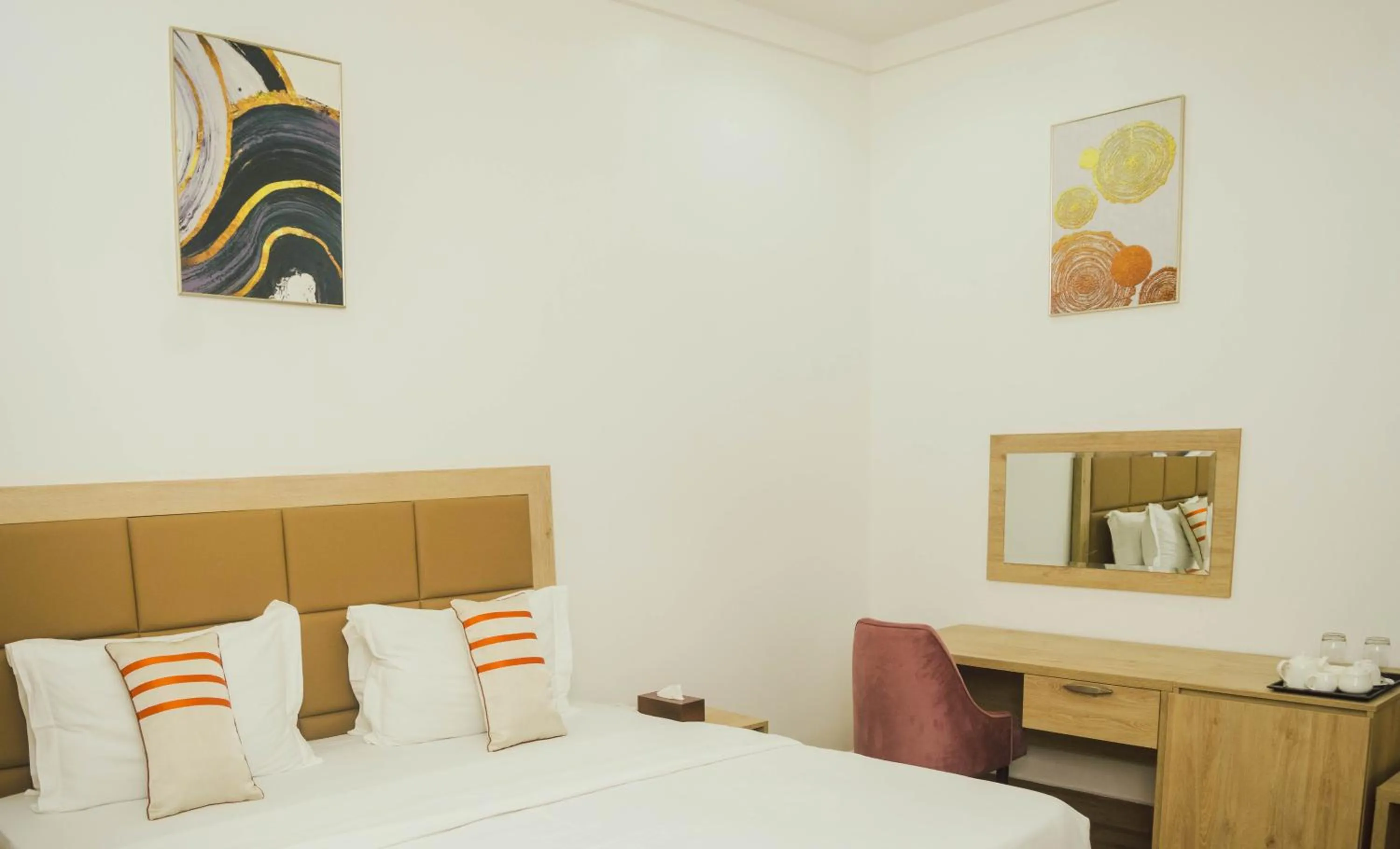 Bed in Quest Boutique Hotel