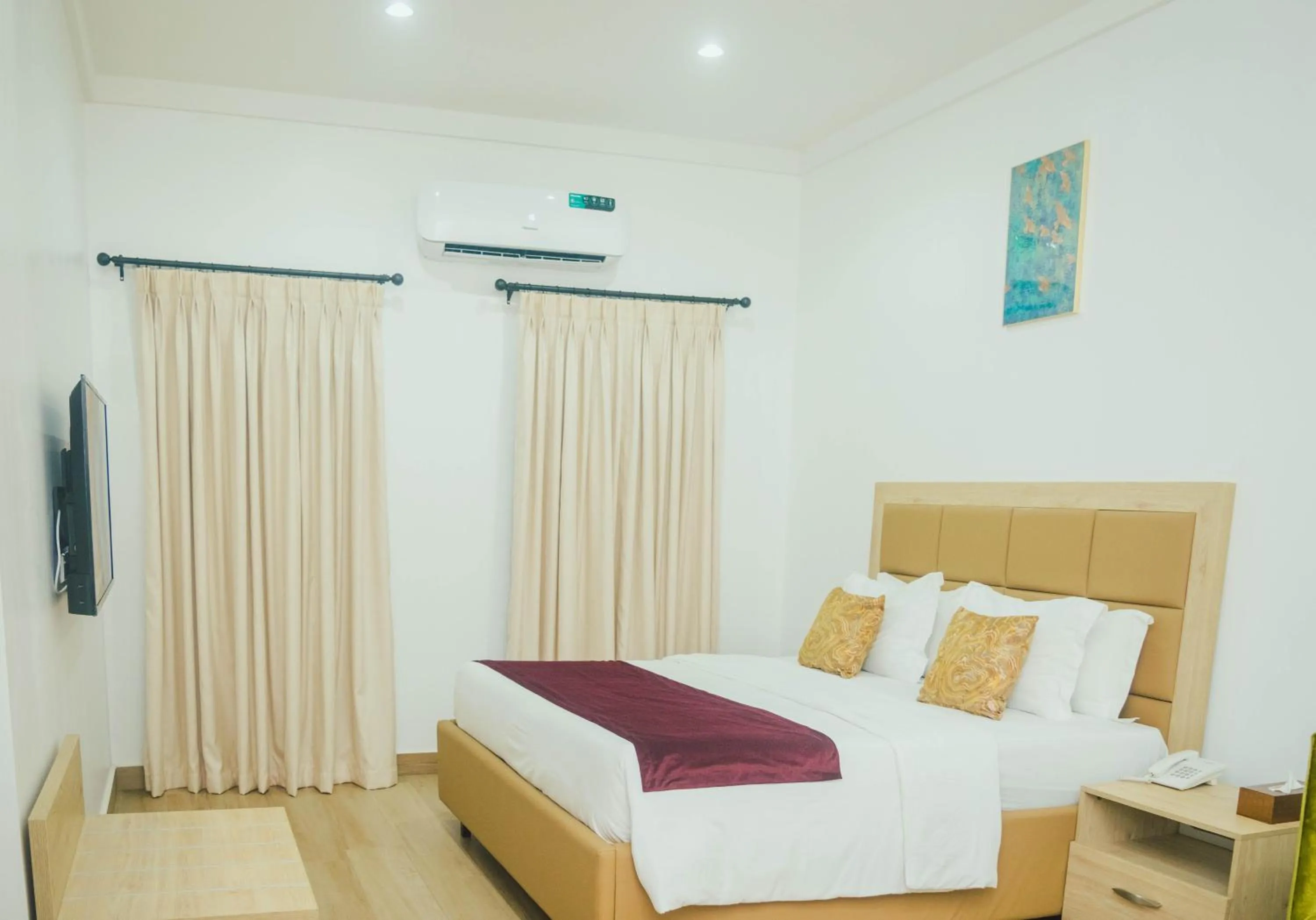 Bed in Quest Boutique Hotel