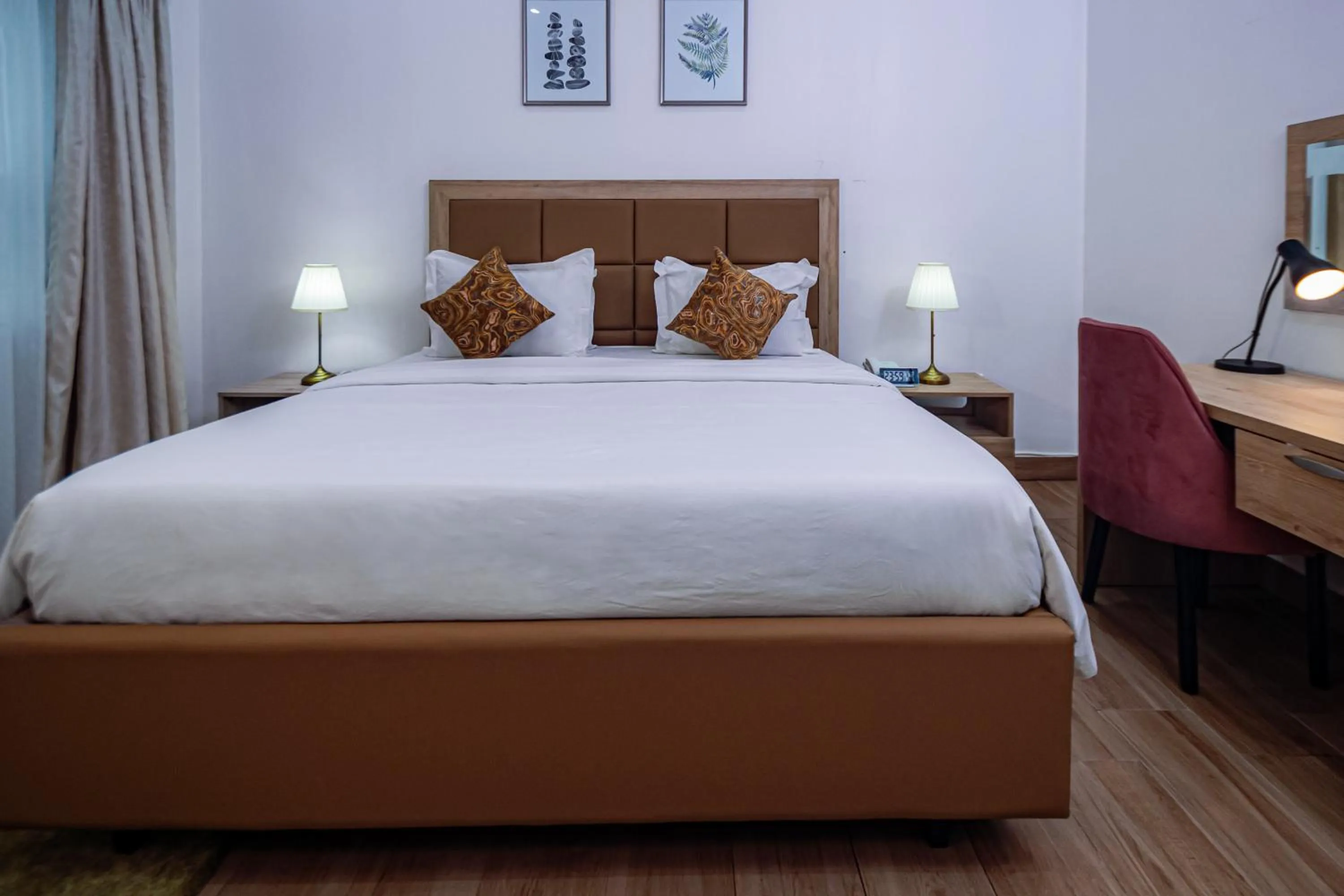 Bed in Quest Boutique Hotel