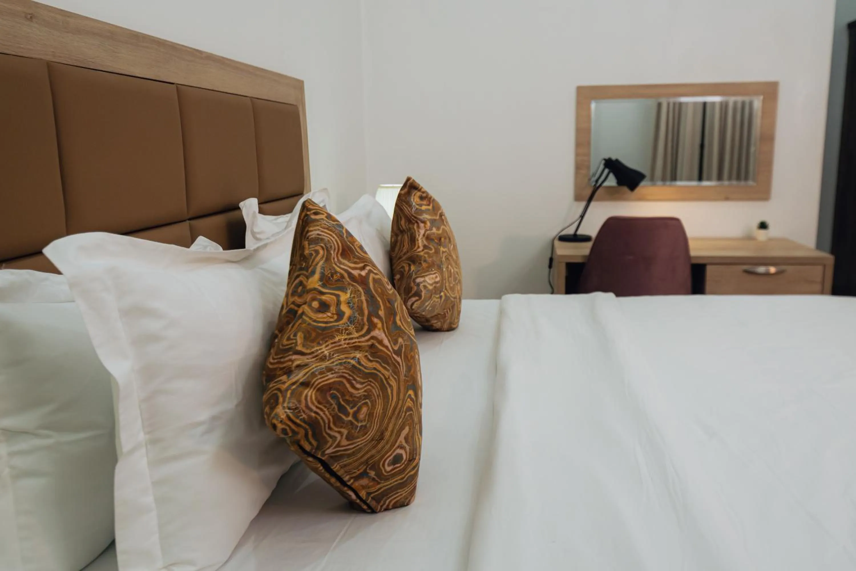 Bed in Quest Boutique Hotel