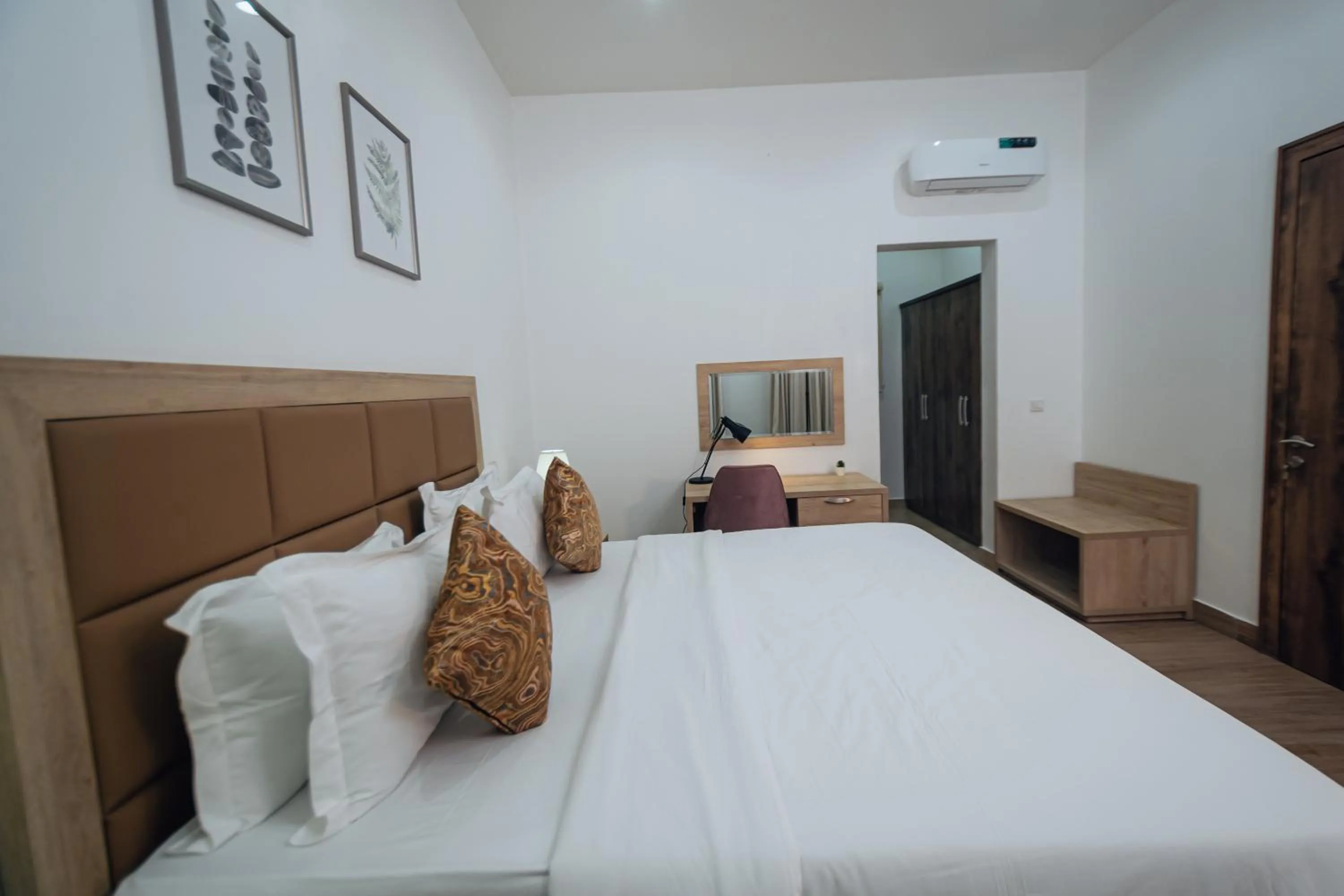 Bed in Quest Boutique Hotel