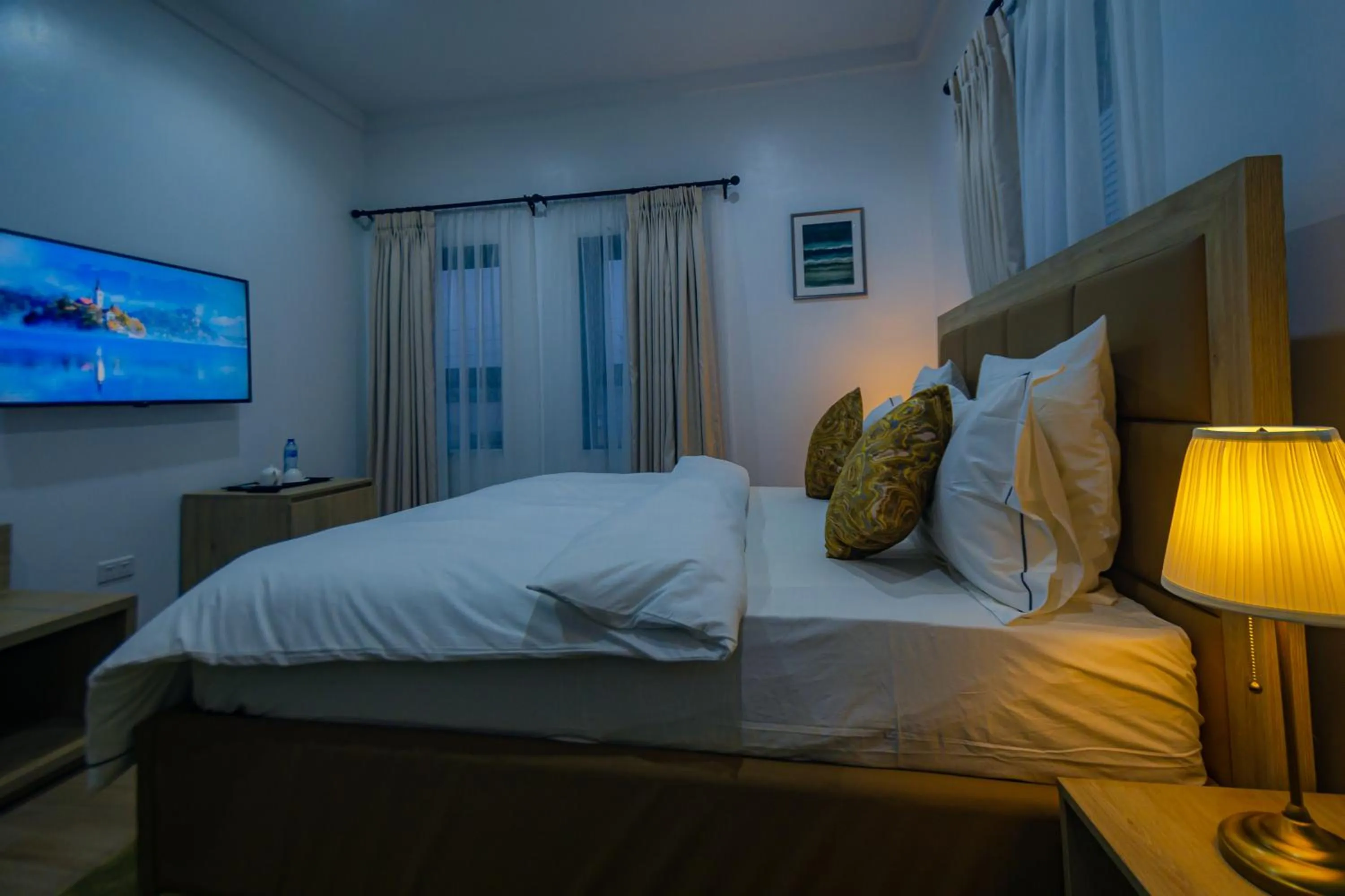 Bed in Quest Boutique Hotel