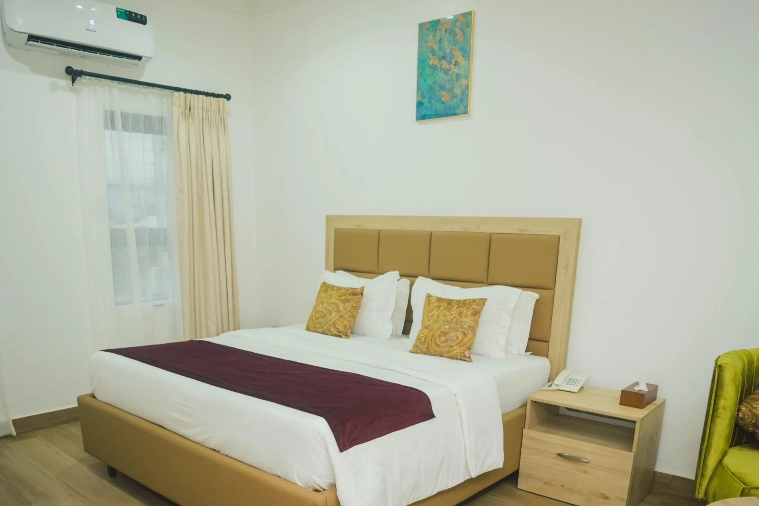 Bed in Quest Boutique Hotel