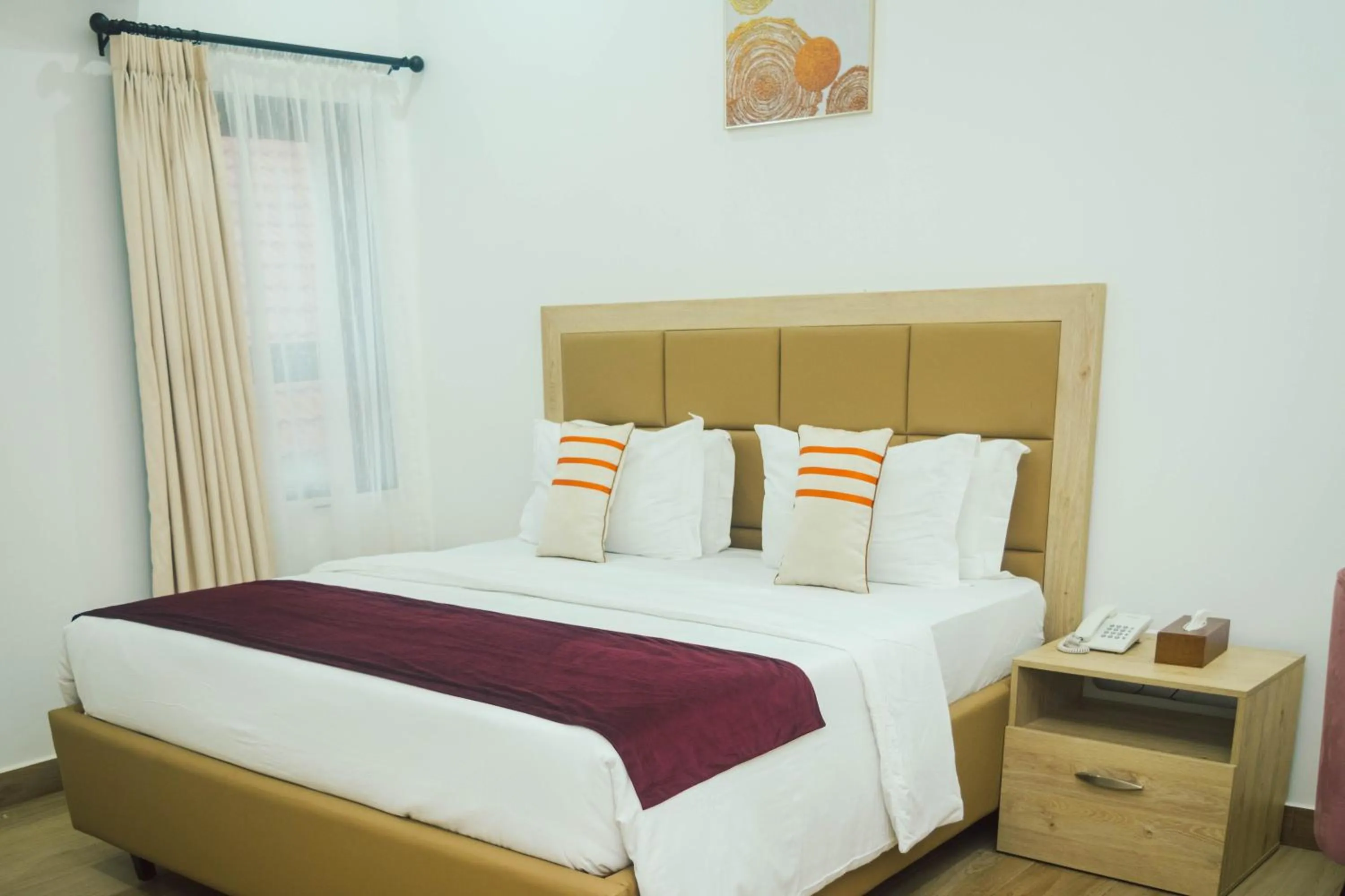 Bed in Quest Boutique Hotel