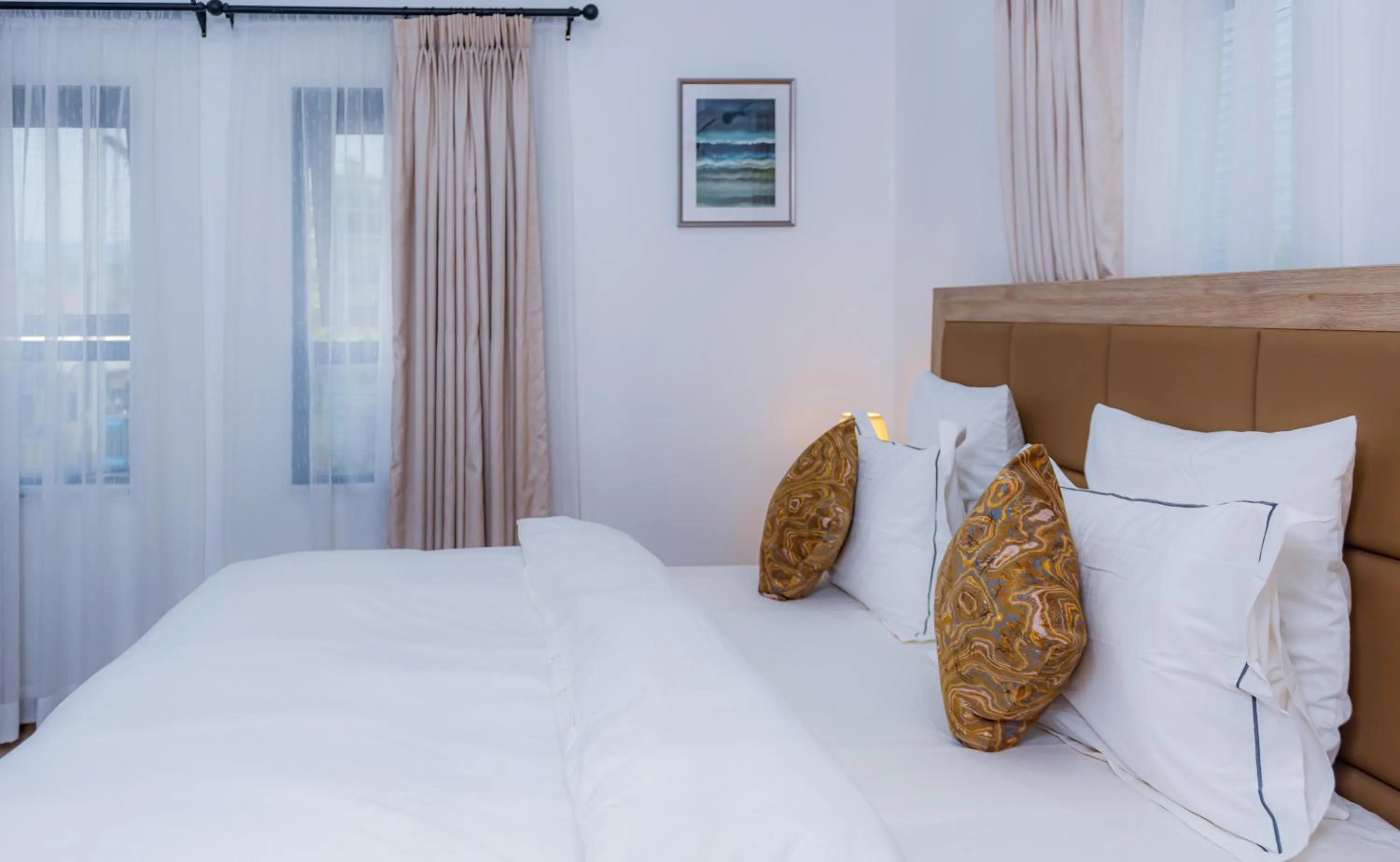 Bed in Quest Boutique Hotel