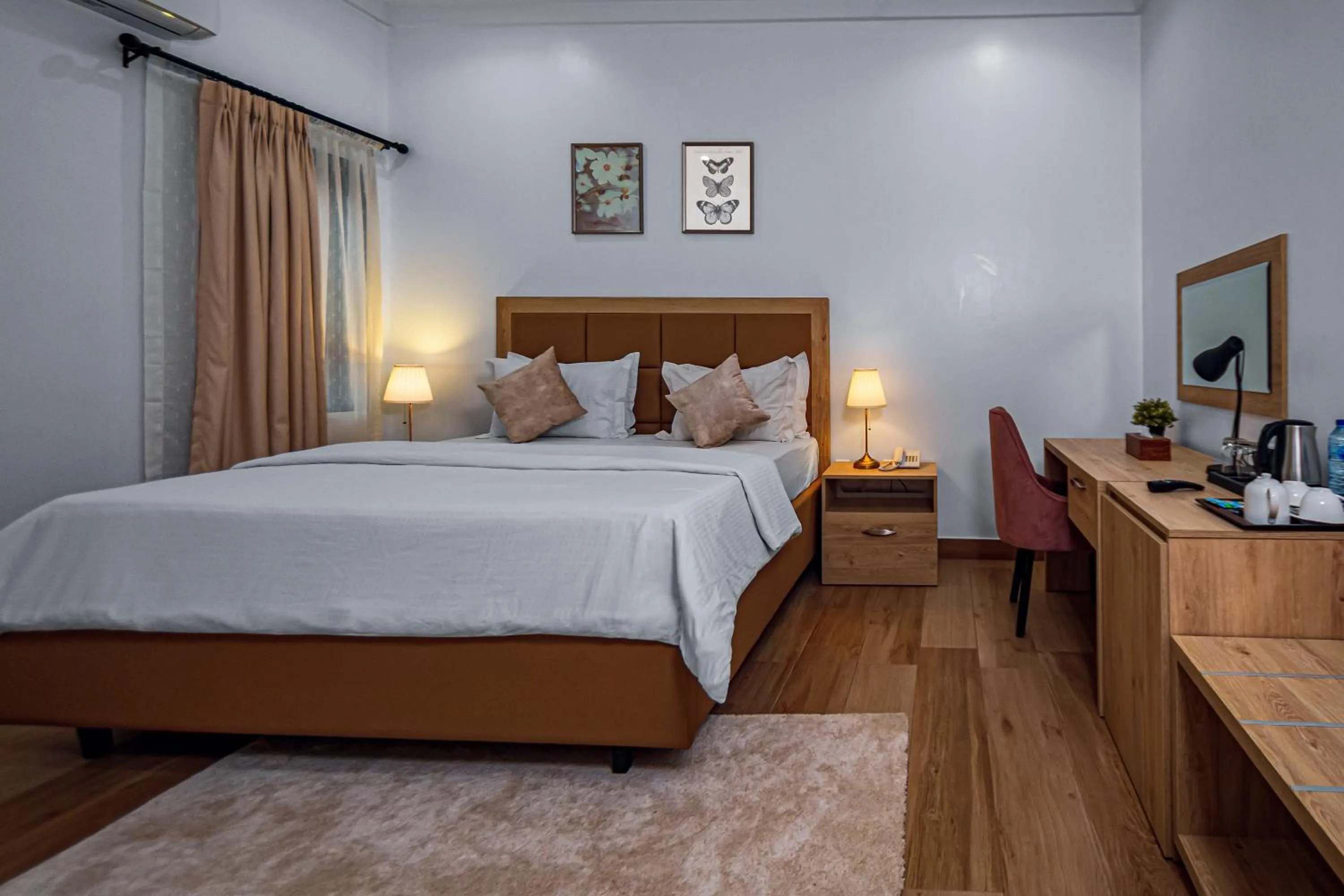 Bed in Quest Boutique Hotel