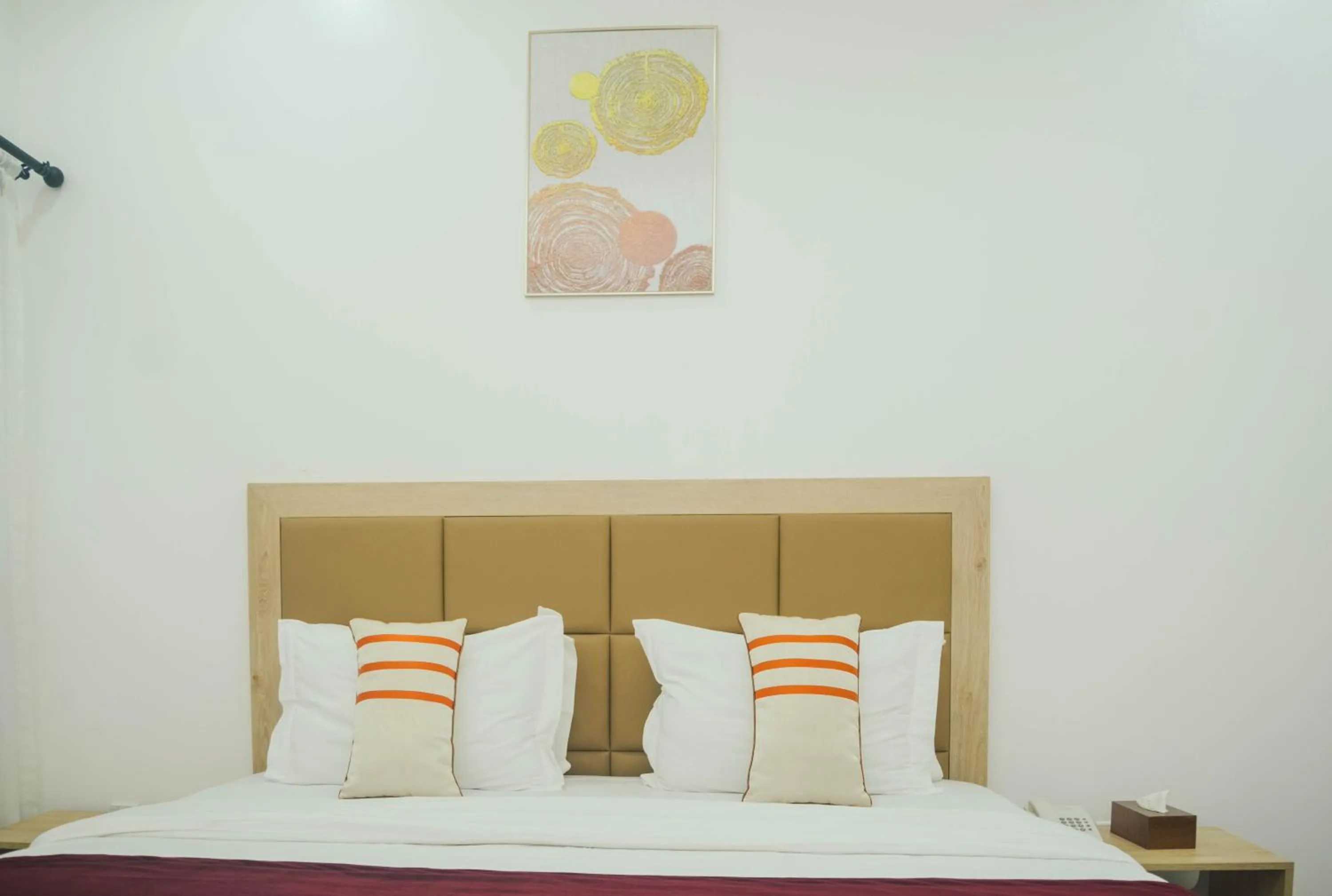 Bed in Quest Boutique Hotel