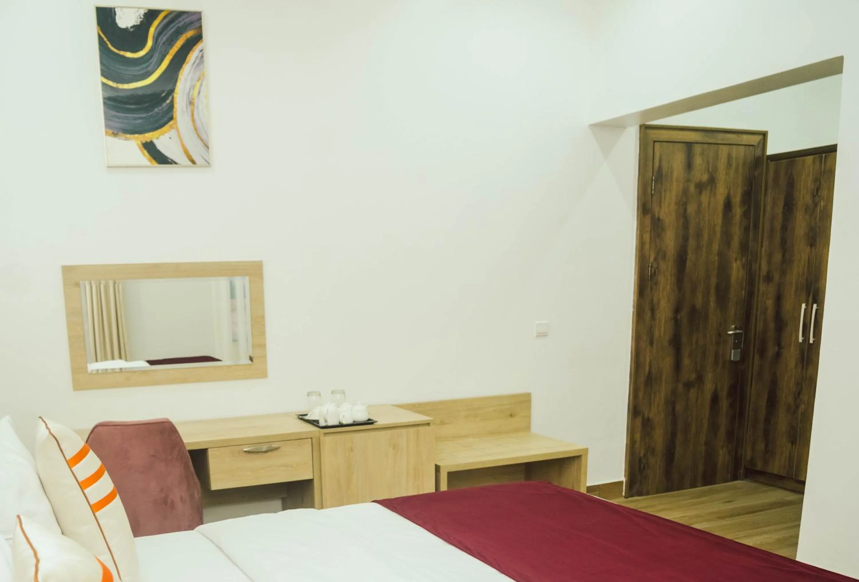 Bed in Quest Boutique Hotel