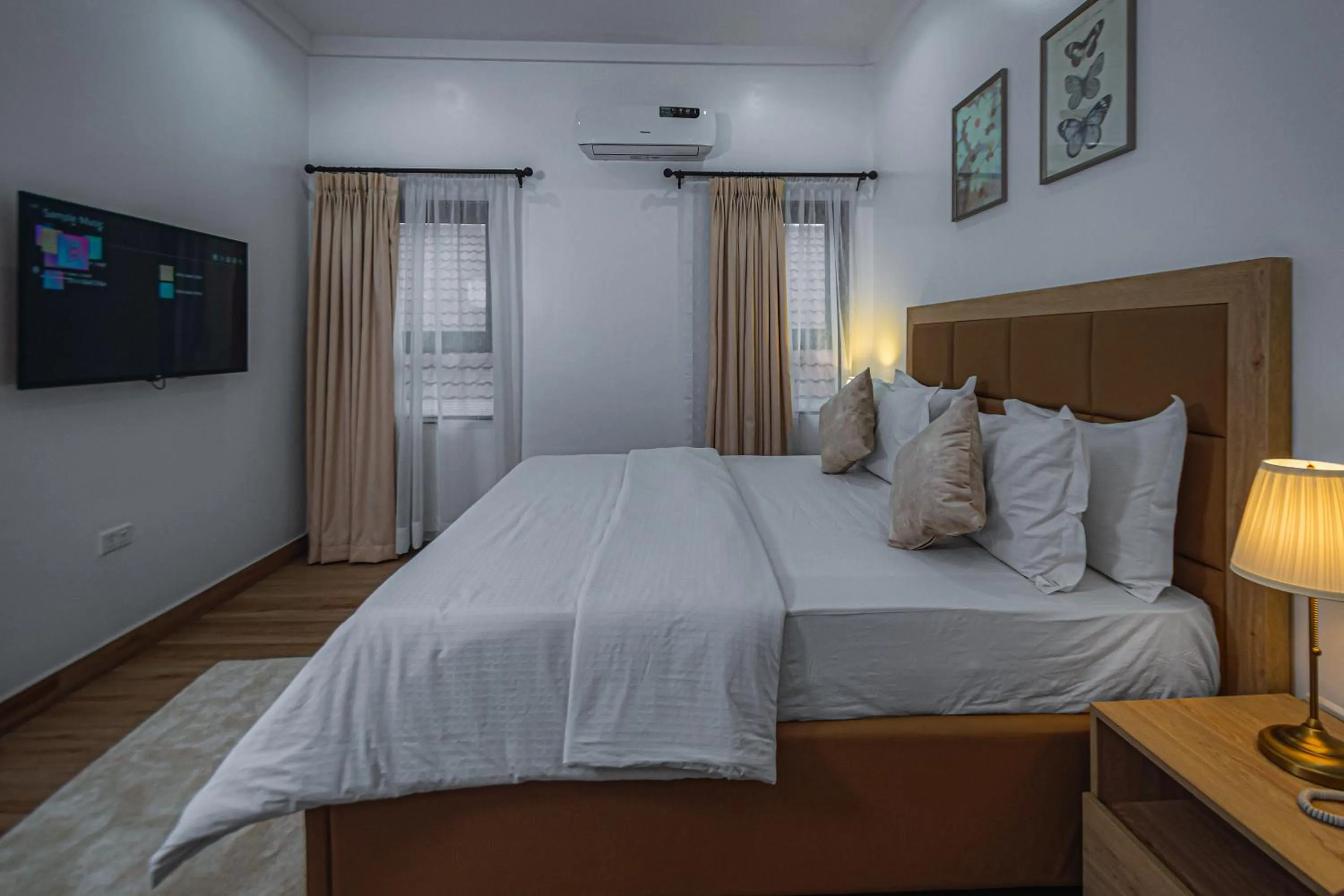 Bed in Quest Boutique Hotel