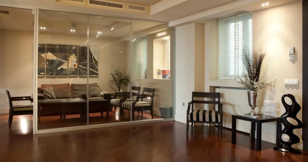 Communal lounge/ TV room in Hotel Moderno Puerta del Sol