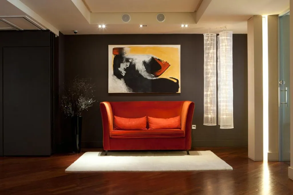 Communal lounge/ TV room in Hotel Moderno Puerta del Sol